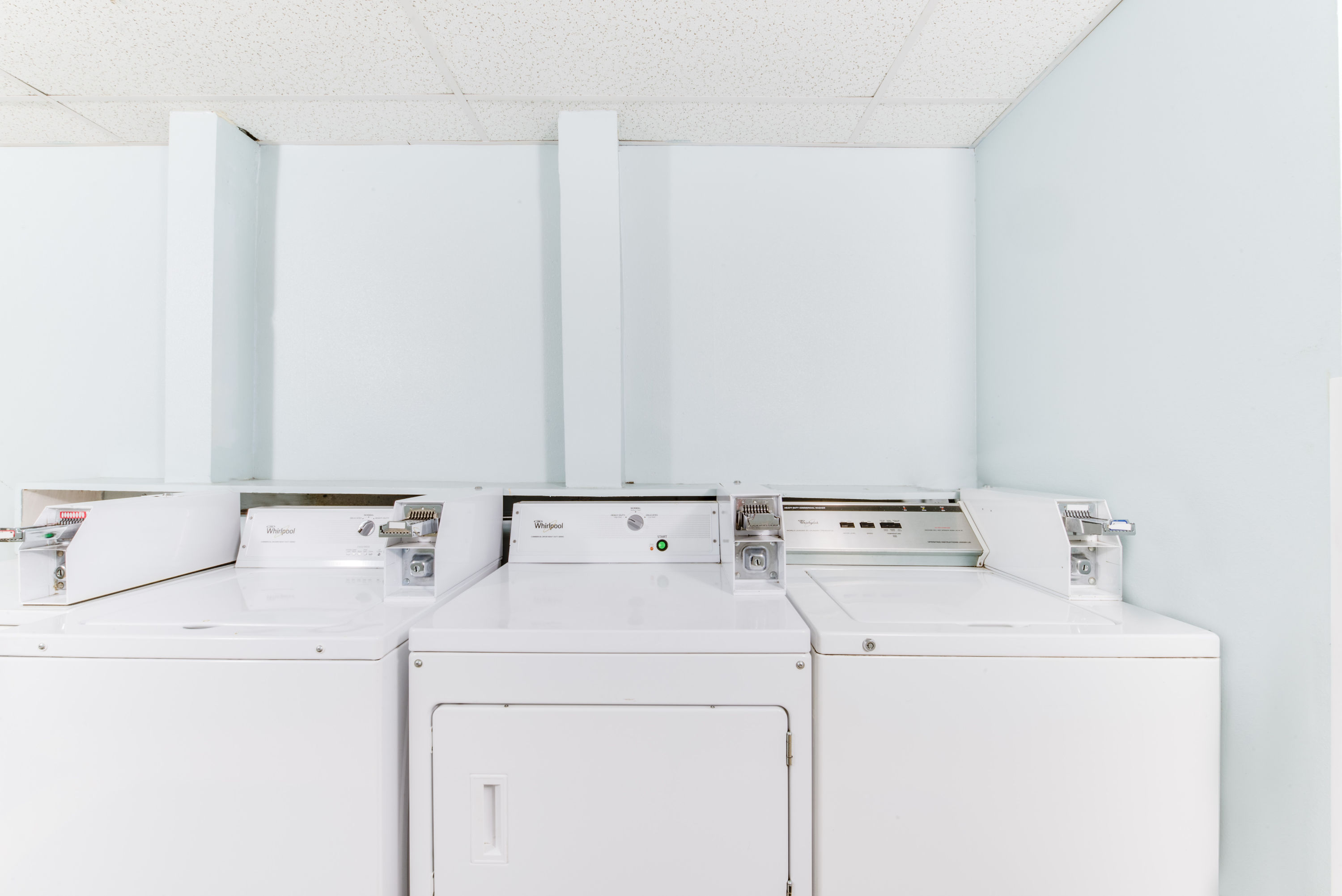 Laundry facilities at Days Inn & Suites by Wyndham Laredo in Laredo, Texas