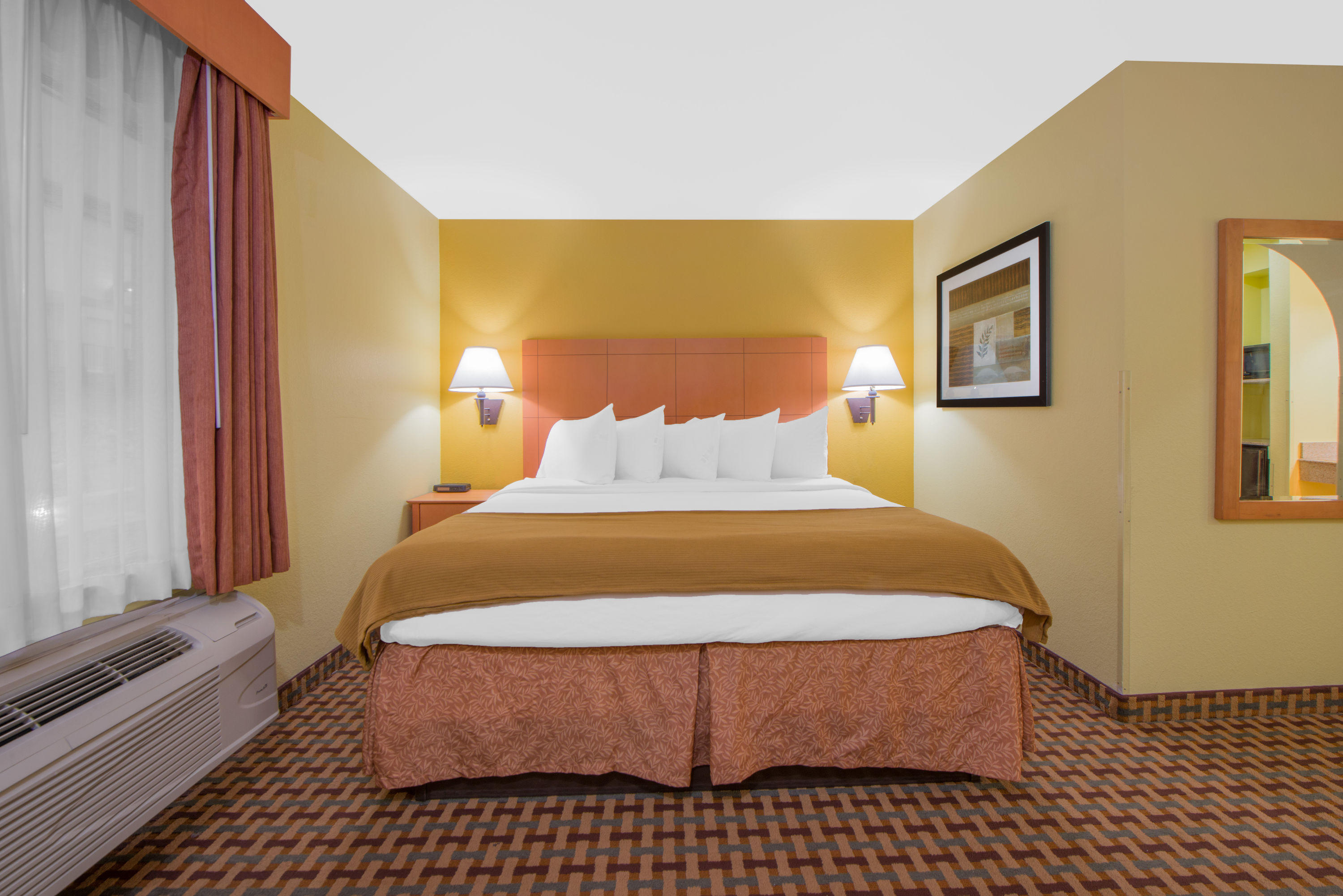 Guest room at the Days Inn by Wyndham Lubbock South in Lubbock, Texas