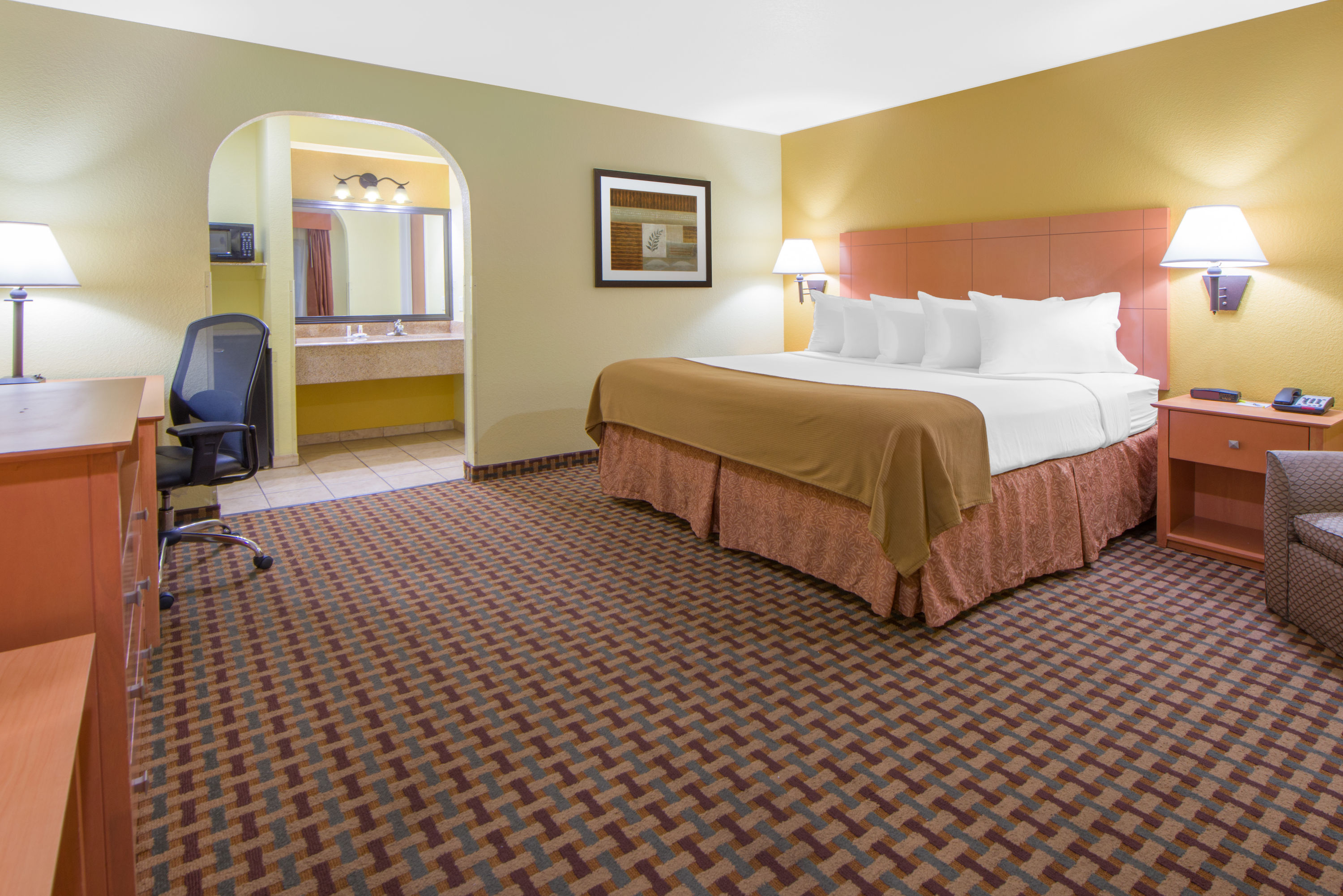 Guest room at the Days Inn by Wyndham Lubbock South in Lubbock, Texas