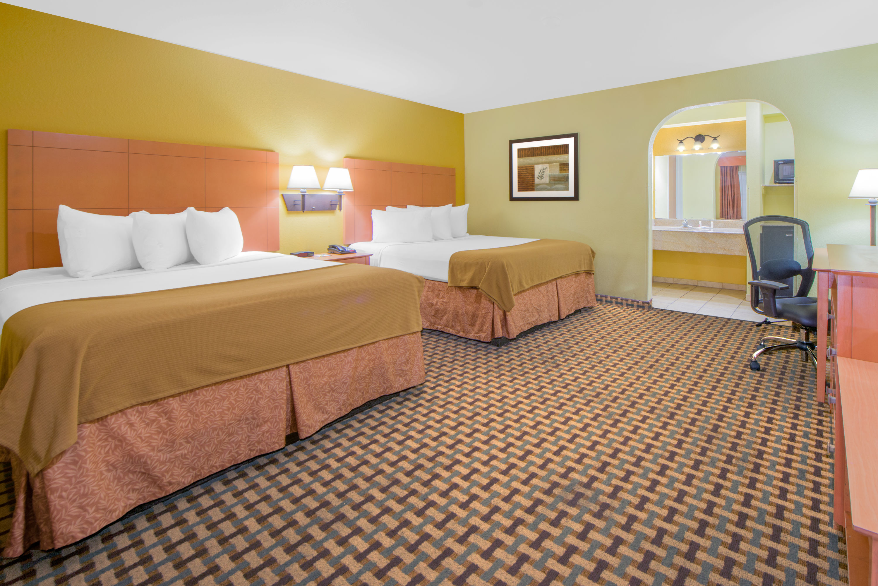 Guest room at the Days Inn by Wyndham Lubbock South in Lubbock, Texas