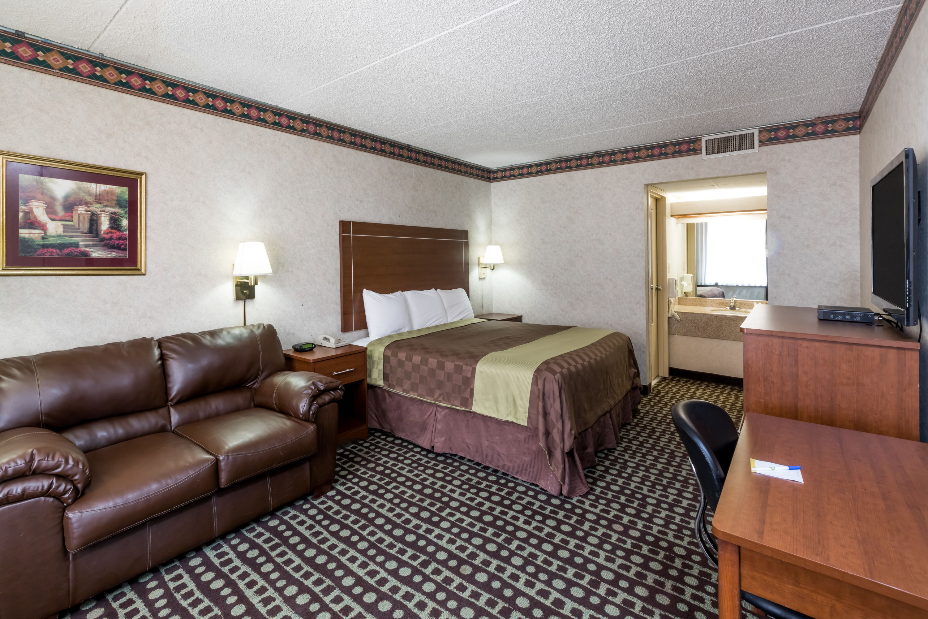 Guest room at the Days Inn by Wyndham Midland in Midland, Texas