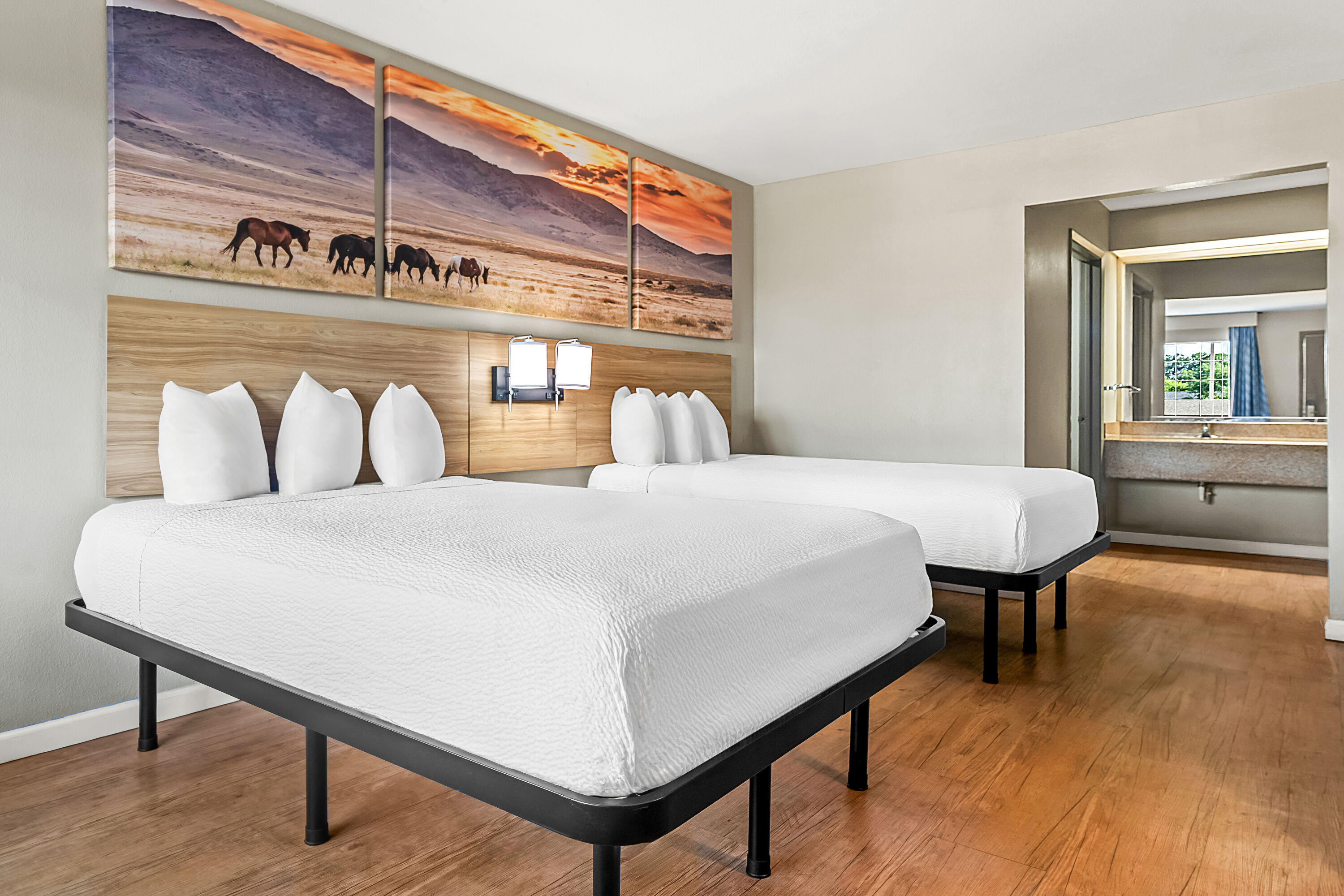 Double bed guest room at the Days Inn by Wyndham Nacogdoches/SFA University/Downtown in Nacogdoches, Texas