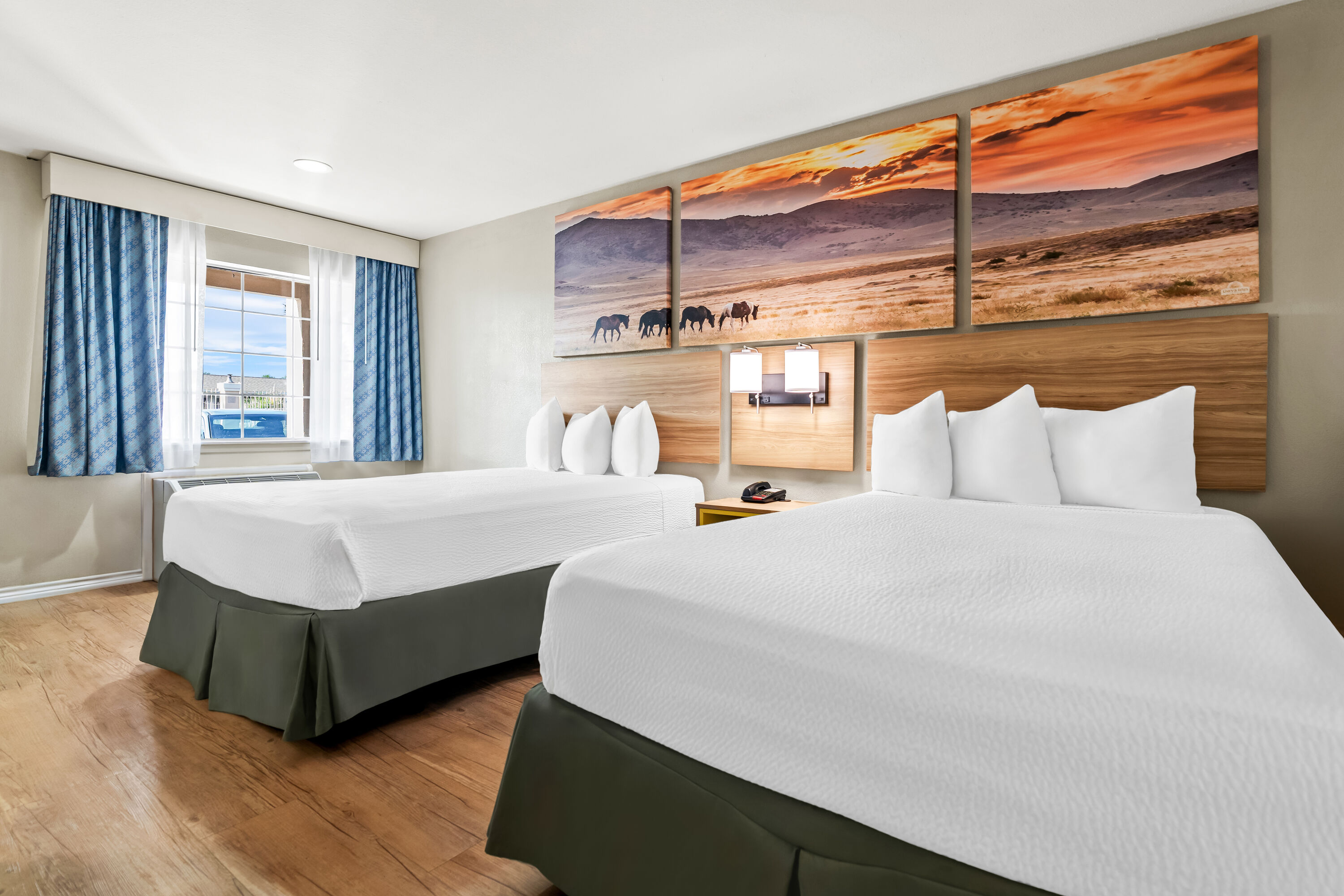 Double bed guest room at the Days Inn by Wyndham Nacogdoches/SFA University/Downtown in Nacogdoches, Texas