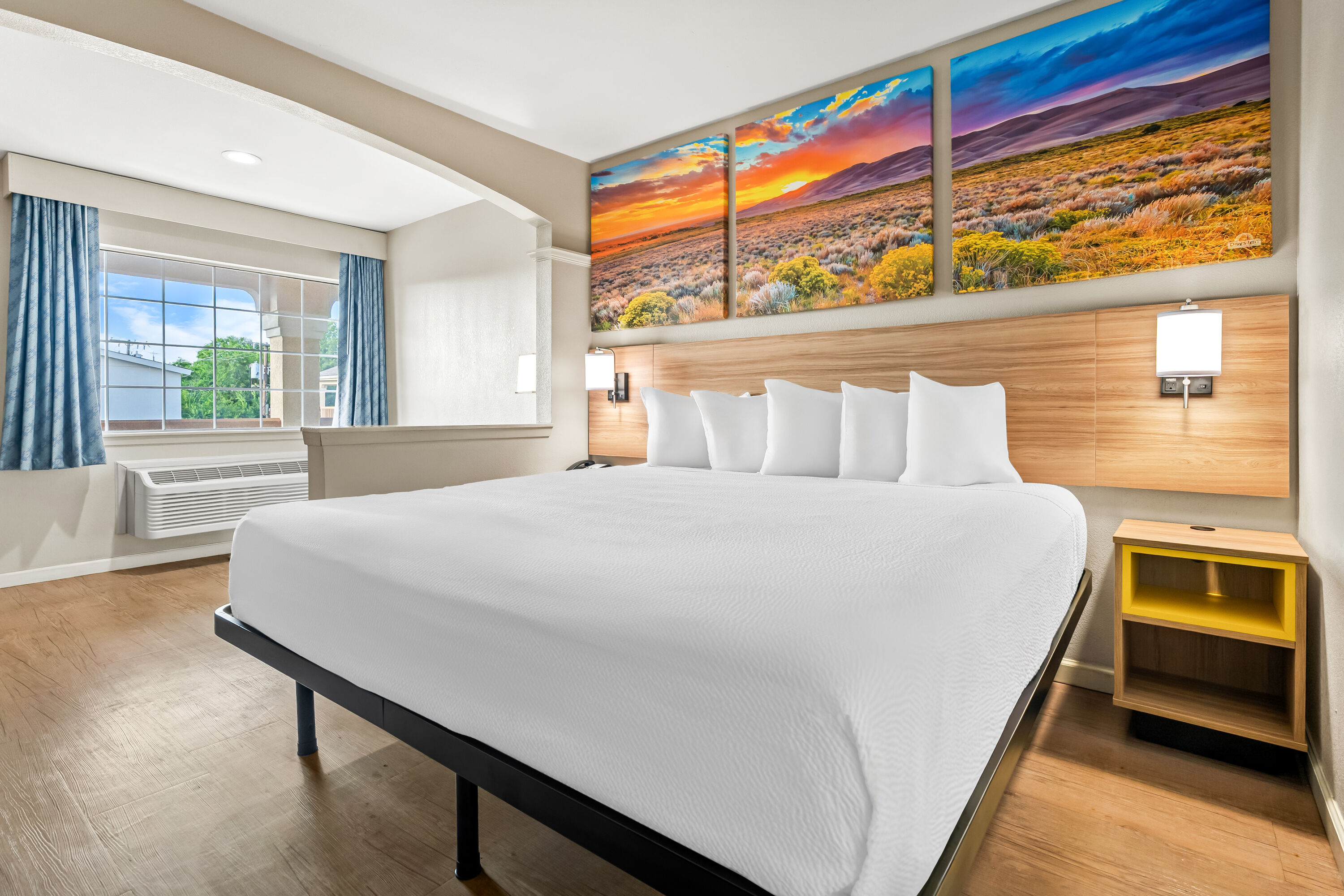 King bed guest room at the Days Inn by Wyndham Nacogdoches/SFA University/Downtown in Nacogdoches, Texas