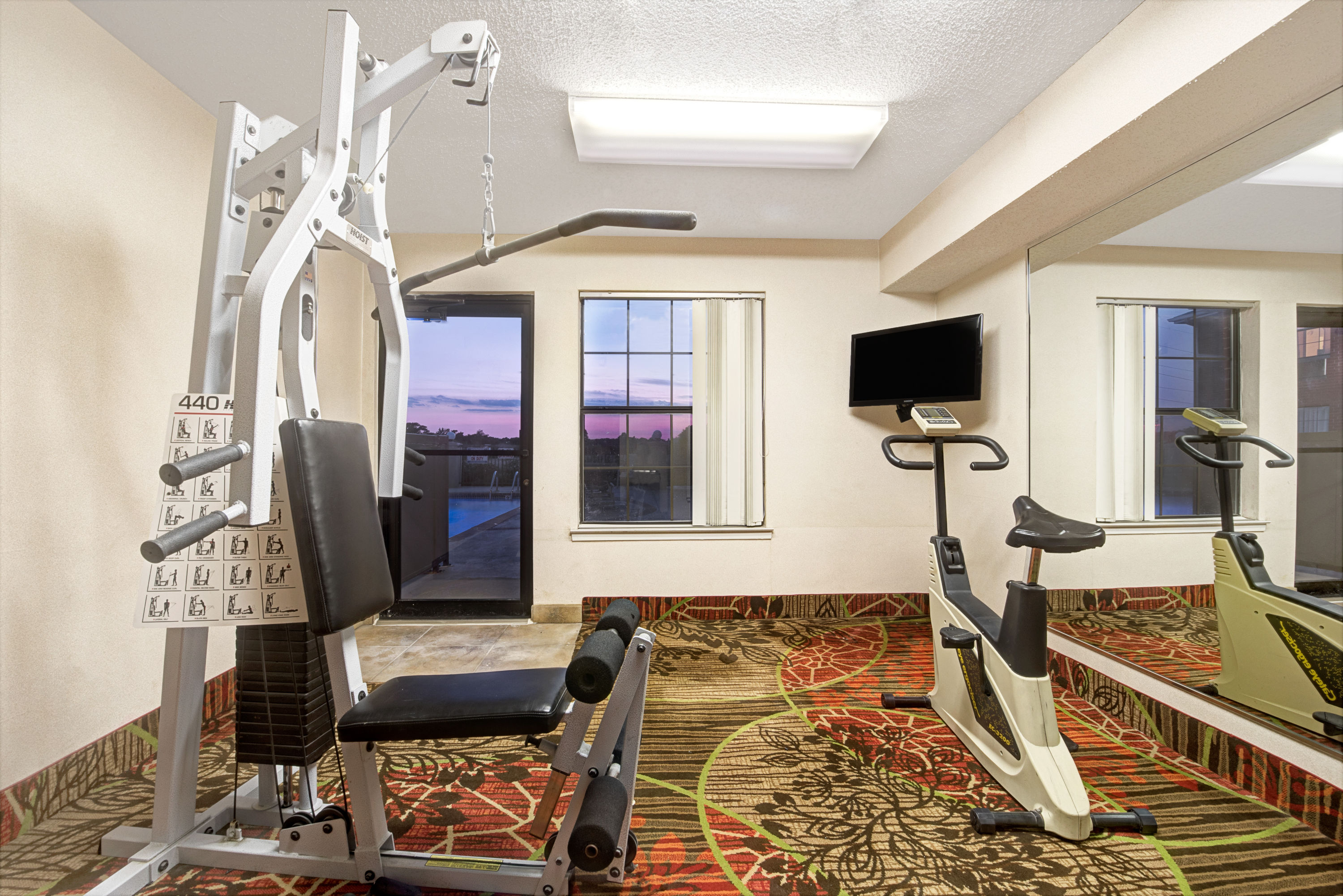 Fitness room at Days Inn by Wyndham Dallas Plano in Plano, Texas