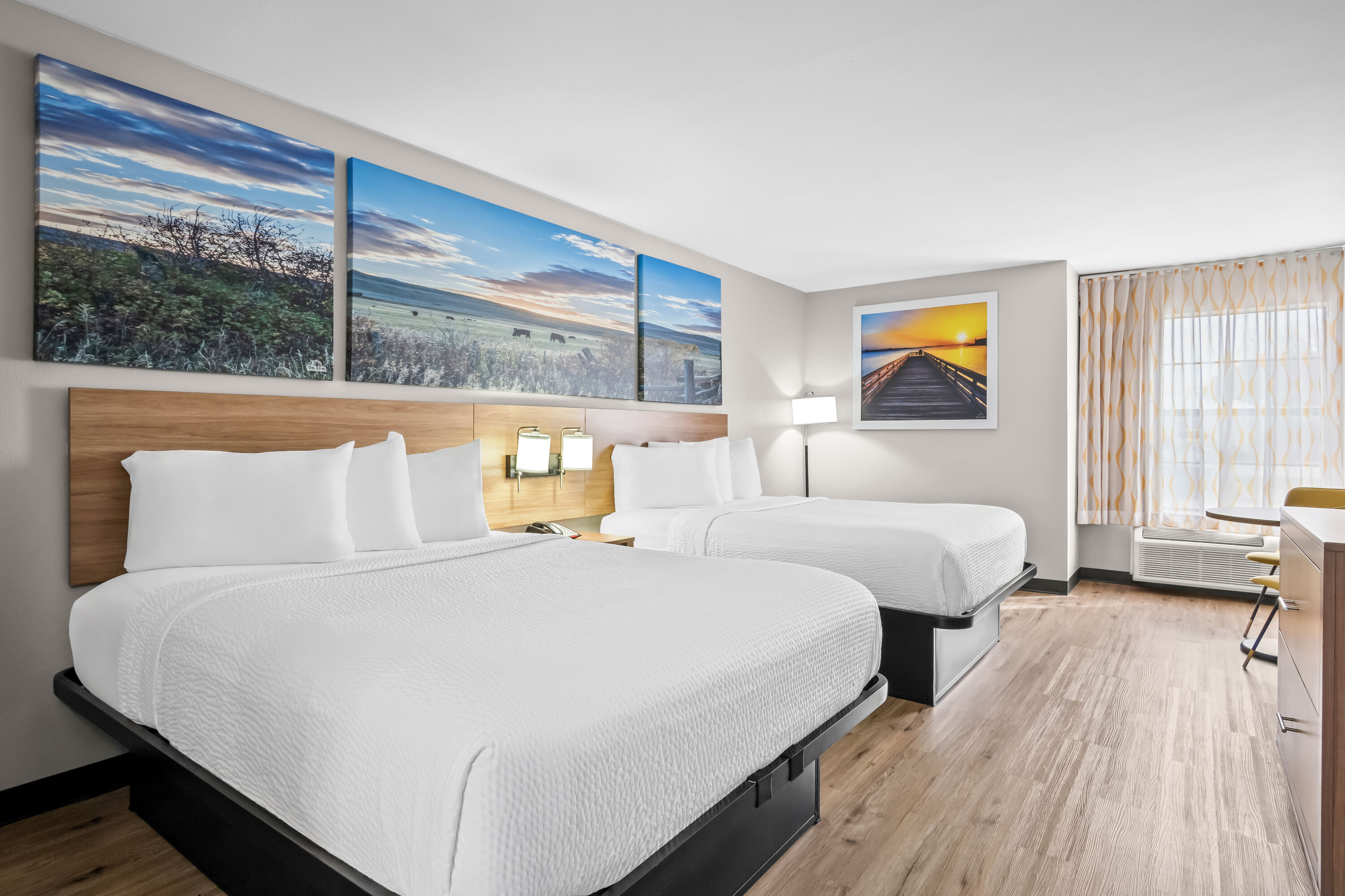 Double bed guest room at the Days Inn by Wyndham Dallas Plano in Plano, Texas