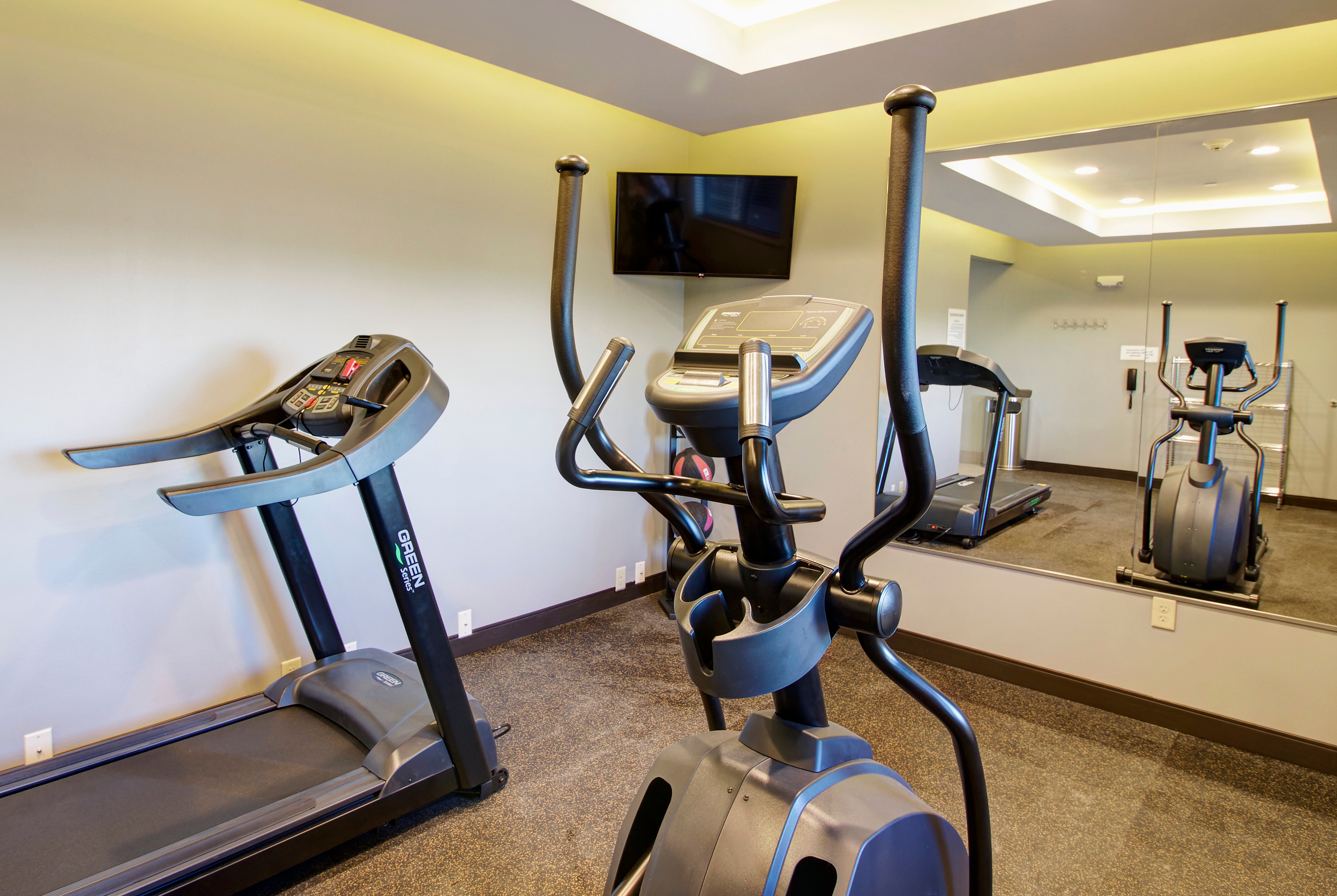 Fitness room at Days Inn & Suites by Wyndham Port Arthur in Port Arthur, Texas