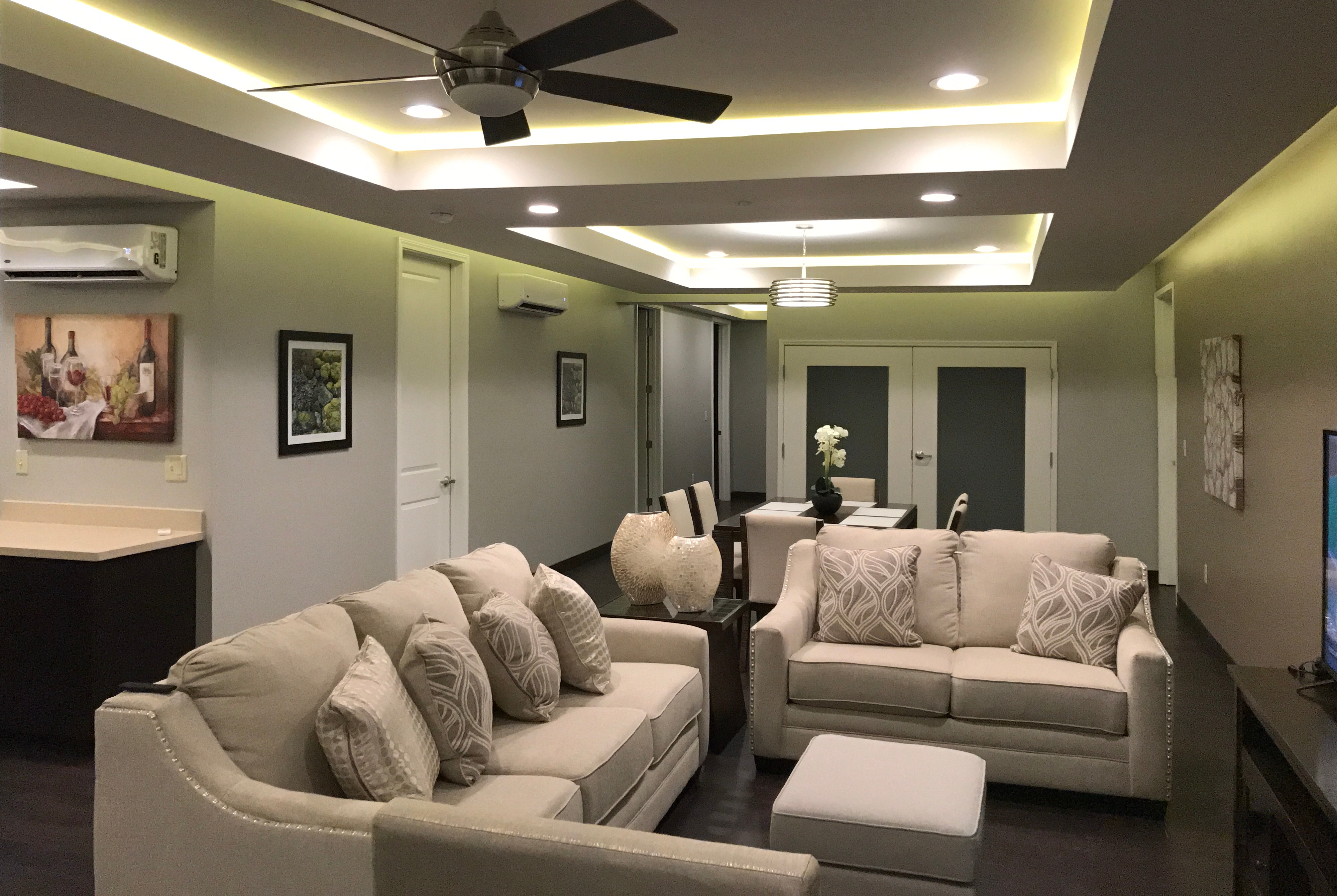 Days Inn & Suites by Wyndham Port Arthur suite living room in Port Arthur, Texas