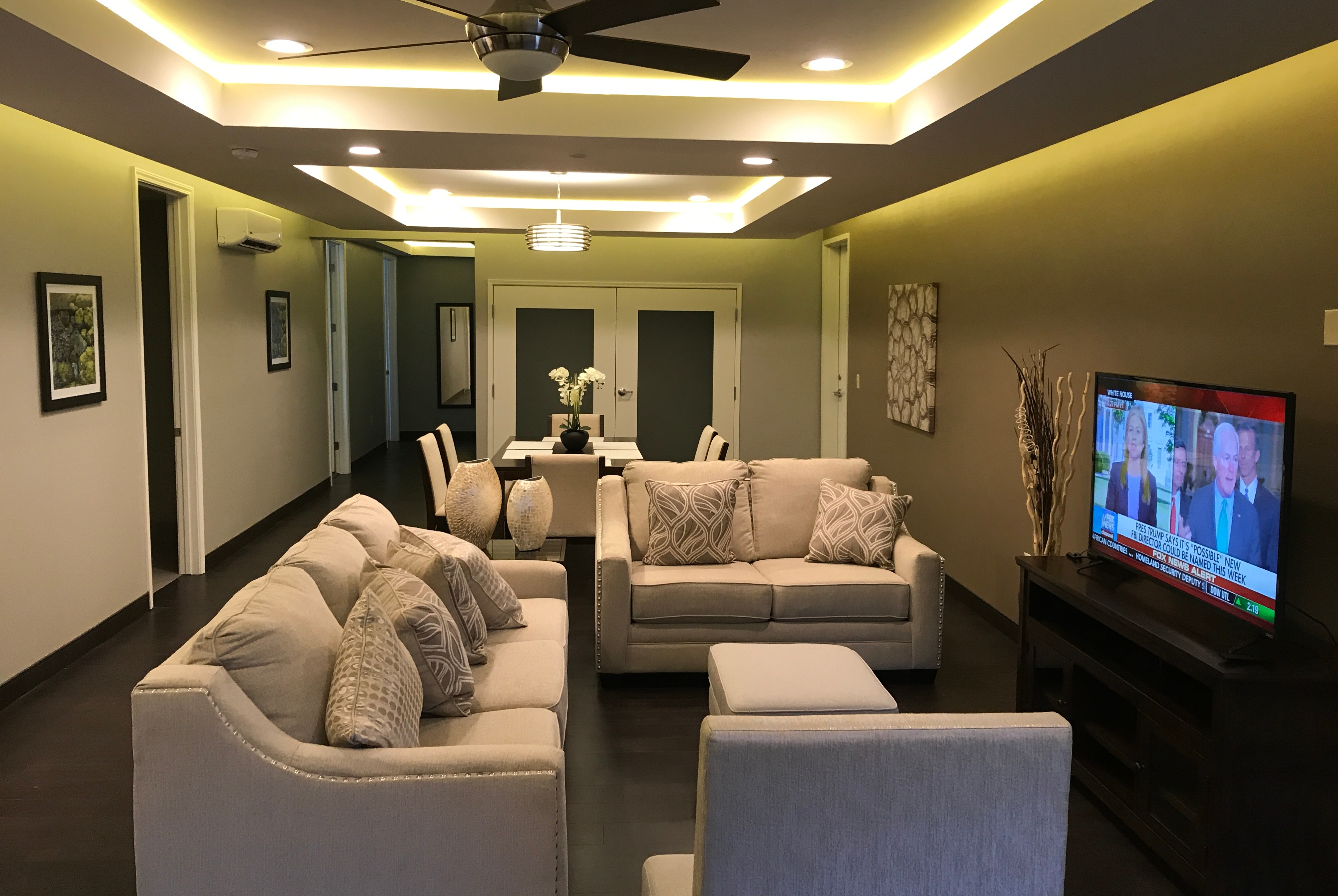 Days Inn & Suites by Wyndham Port Arthur suite living room in Port Arthur, Texas