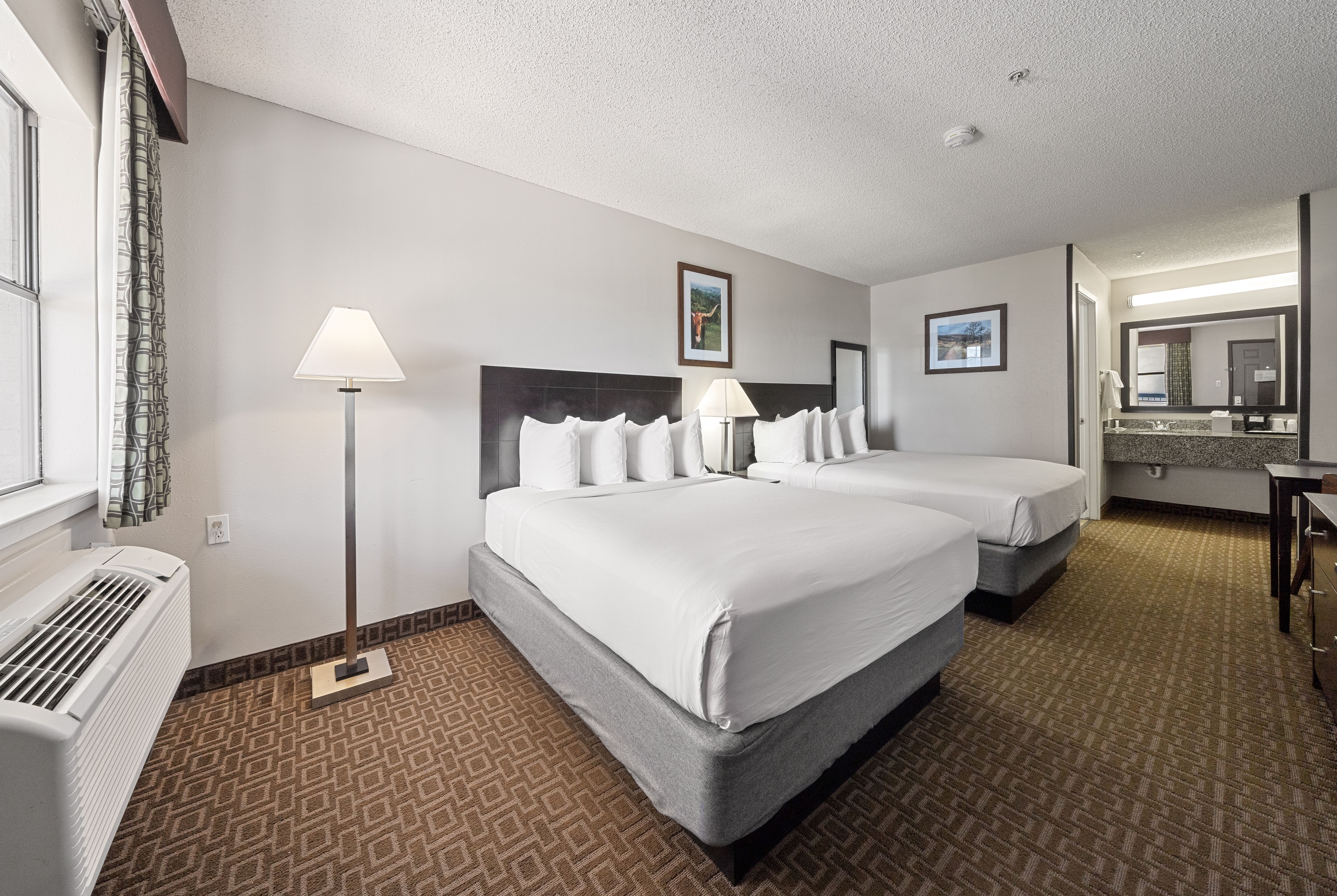 Guest room at the Days Inn by Wyndham Round Rock in Round Rock, Texas