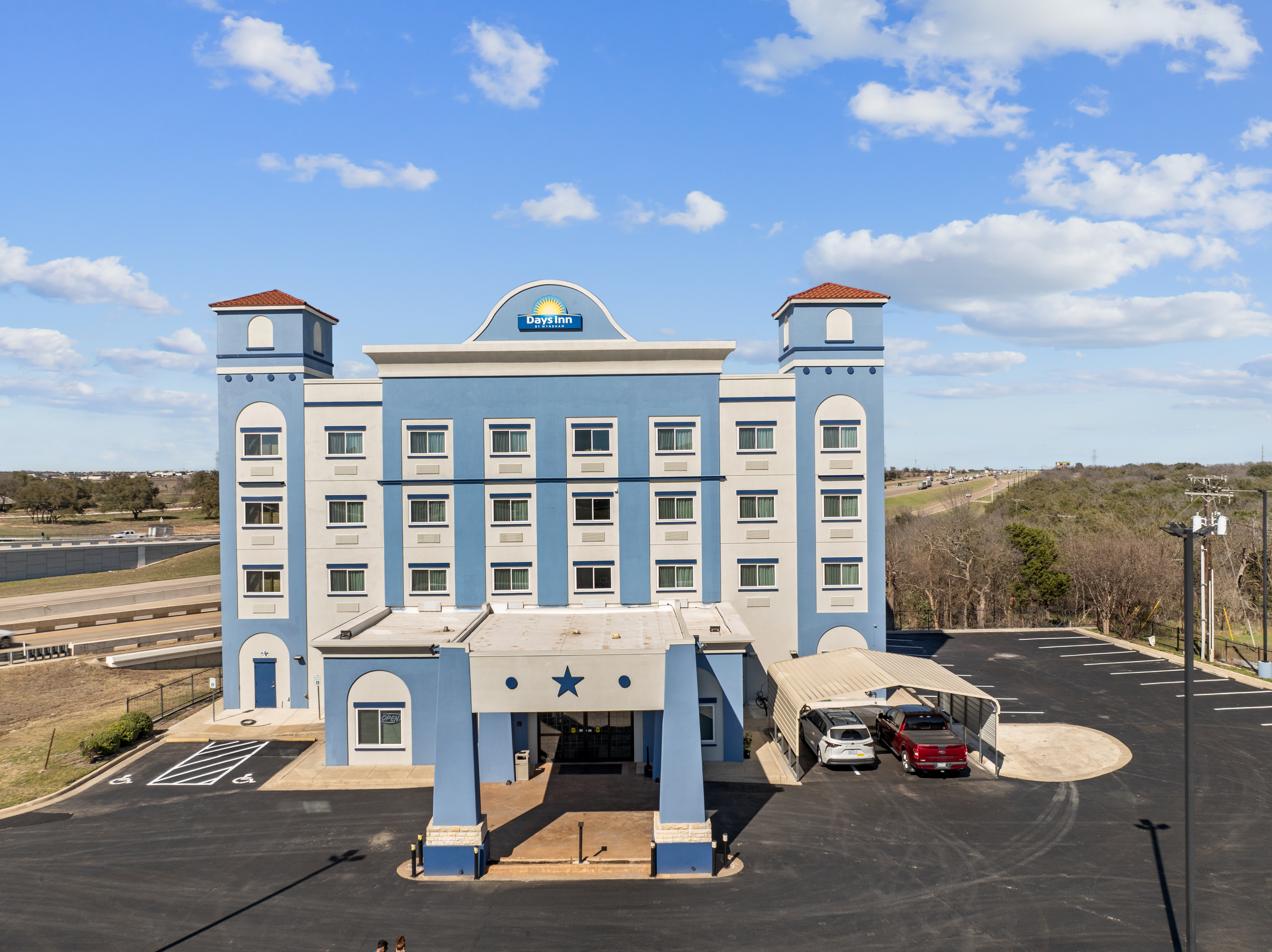 Exterior of Days Inn by Wyndham Salado hotel in Salado, Texas