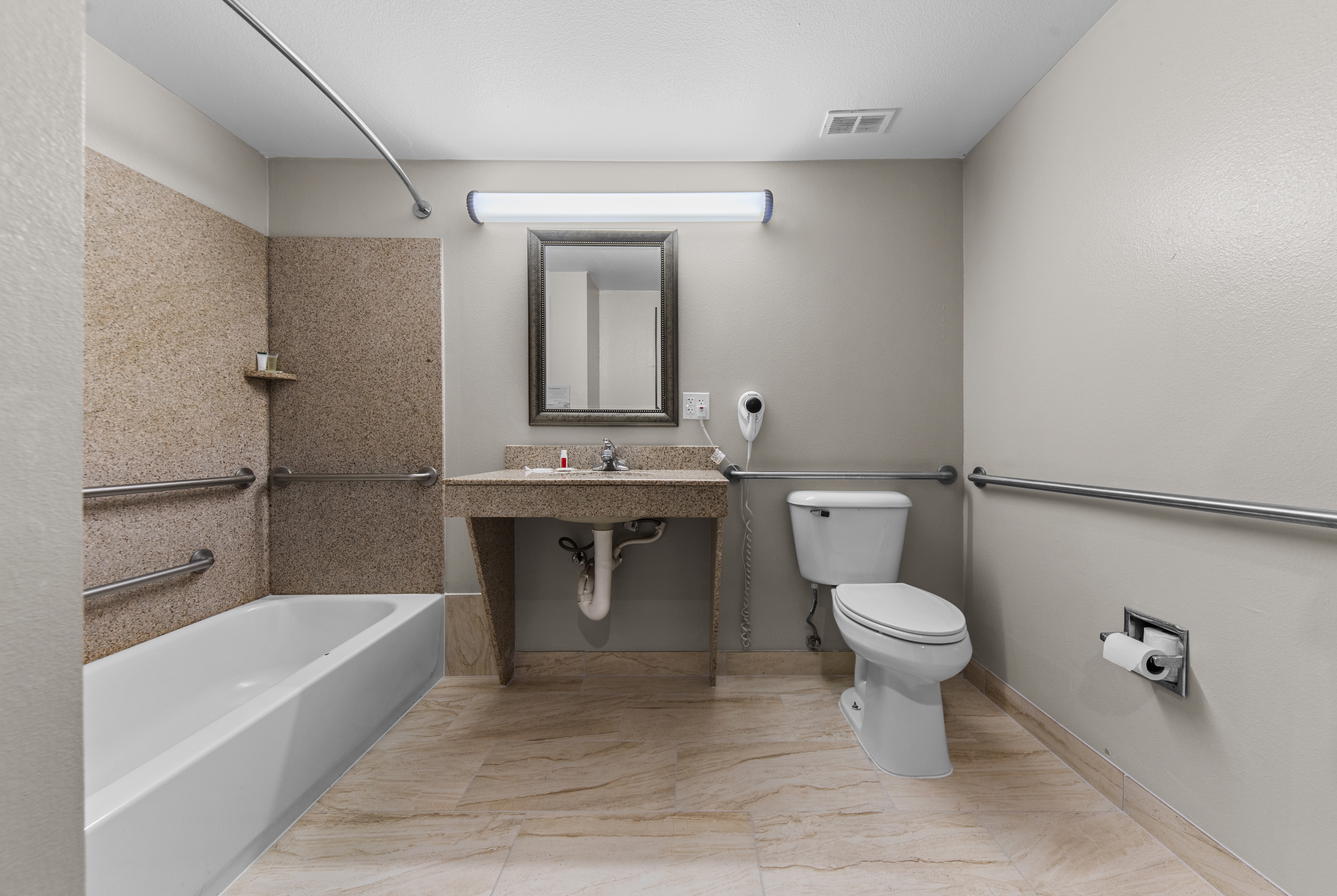 Guest room bath at the Days Inn by Wyndham Salado in Salado, Texas