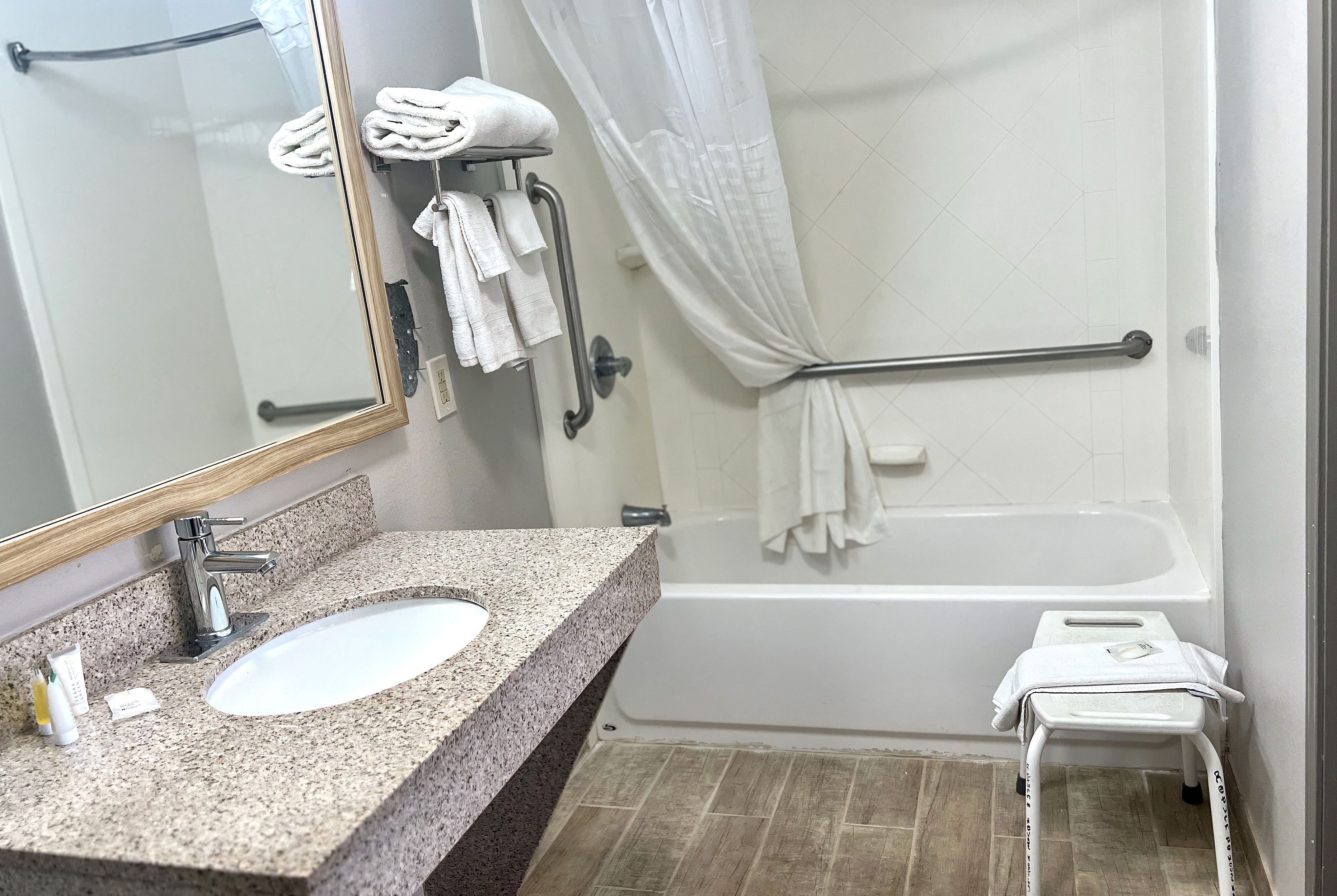 Guest room bath at the Days Inn by Wyndham San Angelo in San Angelo, Texas