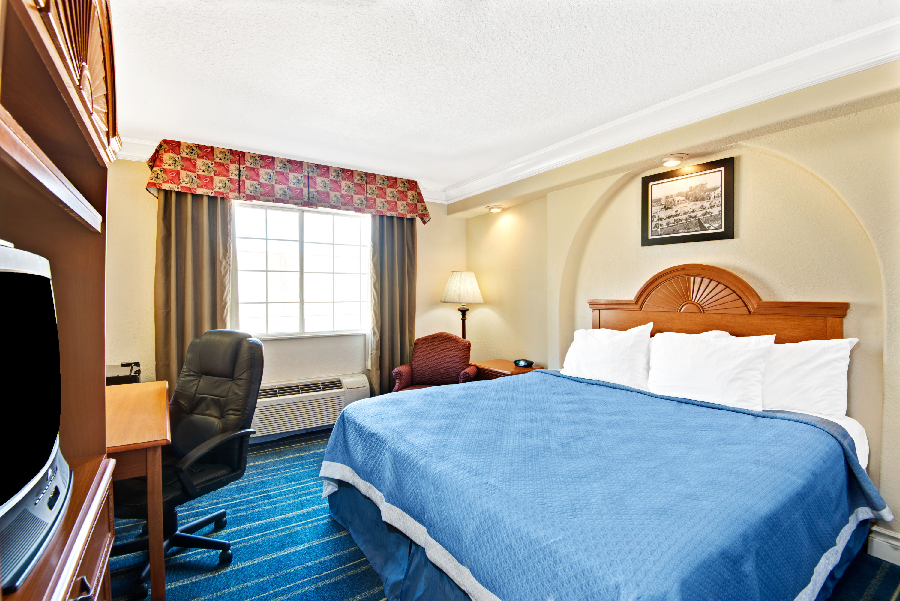 Guest room at the Days Inn by Wyndham San Antonio Airport in San Antonio, Texas