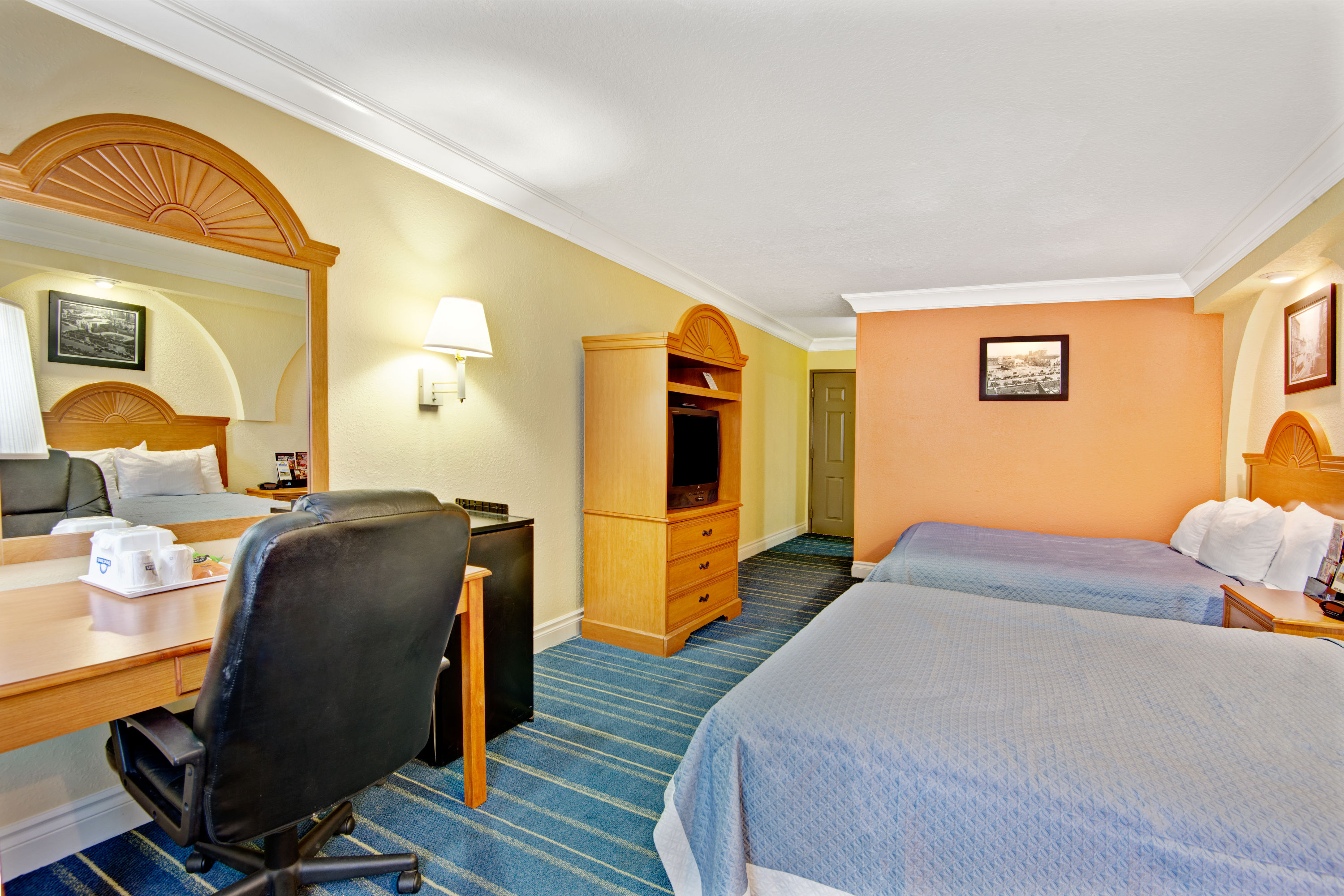 Guest room at the Days Inn by Wyndham San Antonio Airport in San Antonio, Texas
