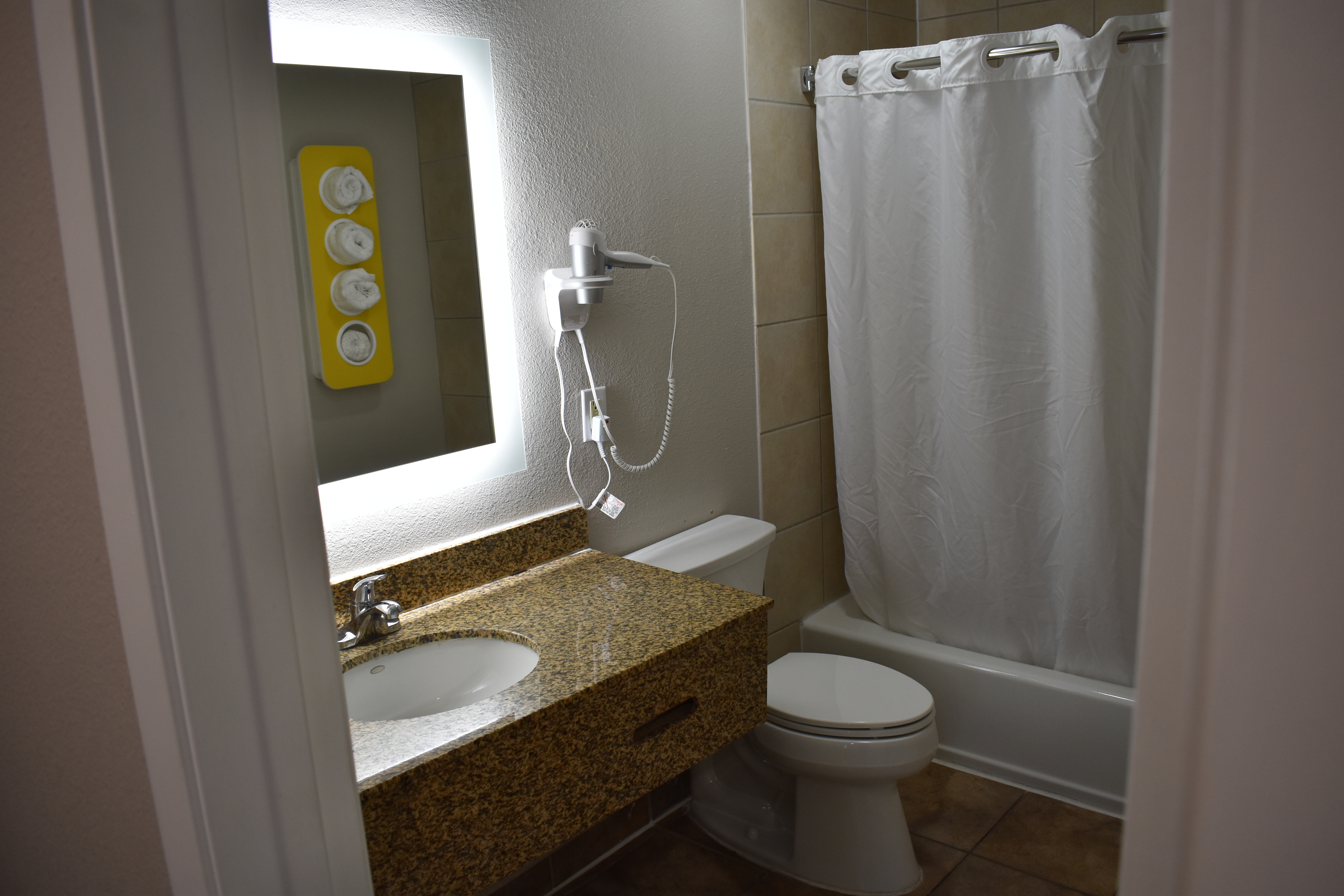 Guest room bath at the Days Inn by Wyndham San Antonio Alamo/Riverwalk in San Antonio, Texas