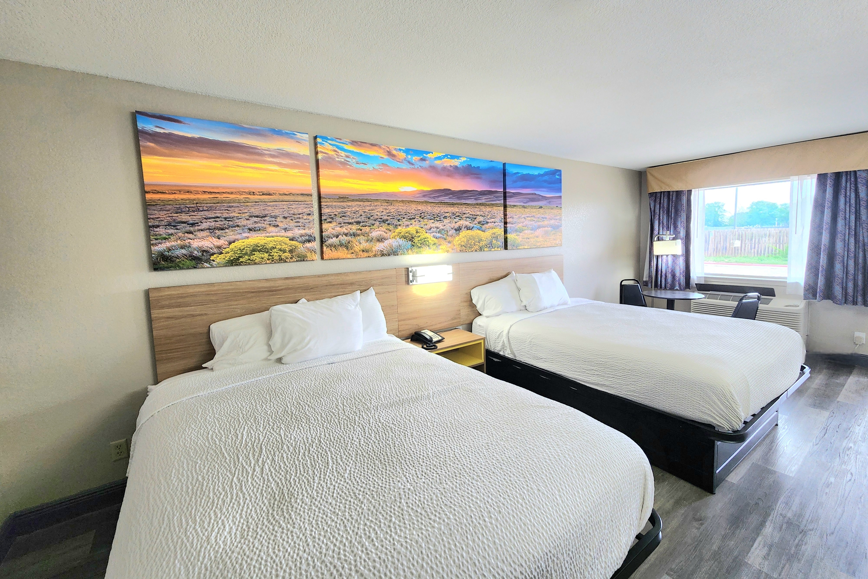 Guest room at the Days Inn by Wyndham San Antonio Southeast/Frost Bank Center in San Antonio, Texas