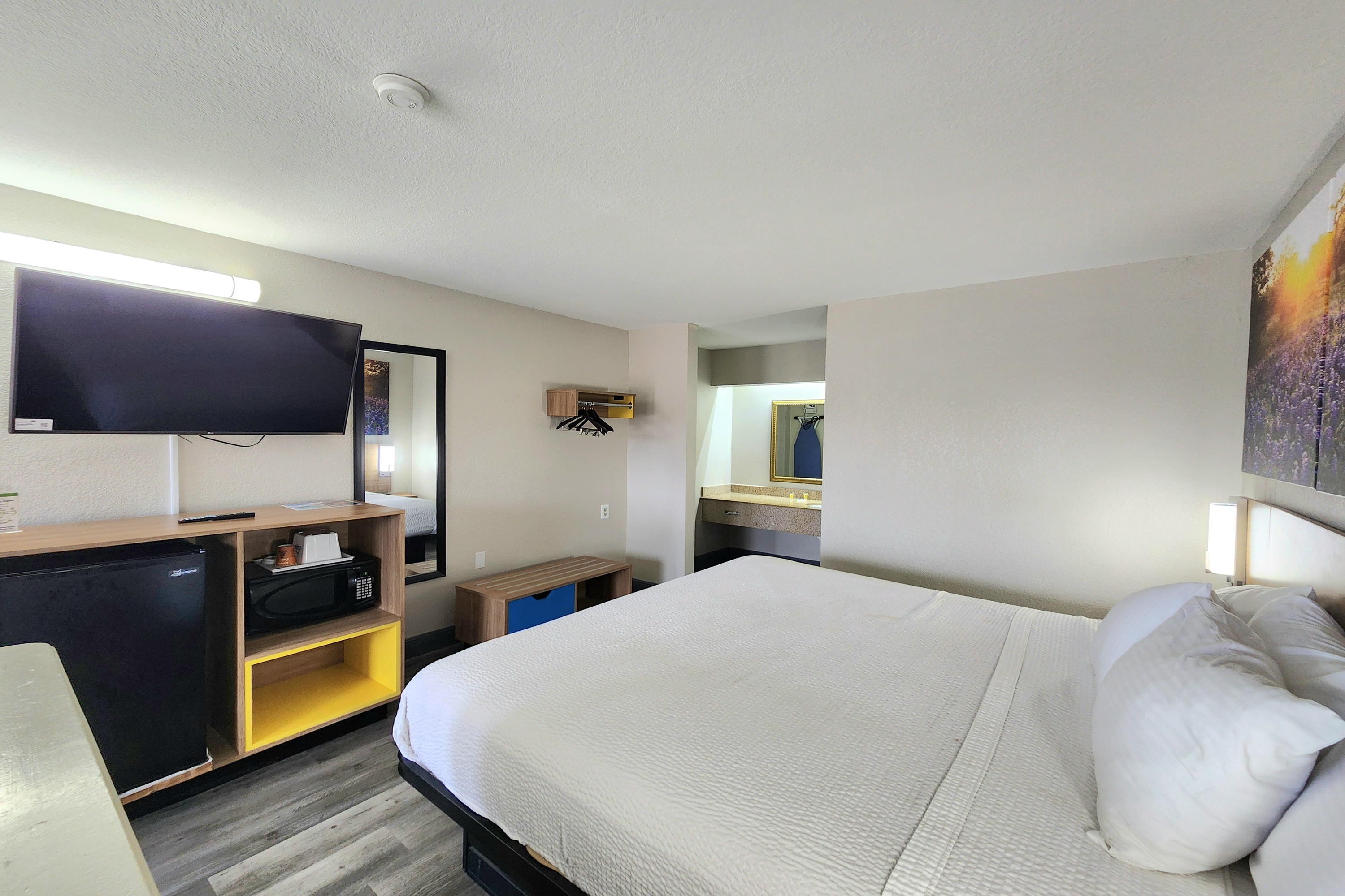 Guest room at the Days Inn by Wyndham San Antonio Southeast/Frost Bank Center in San Antonio, Texas