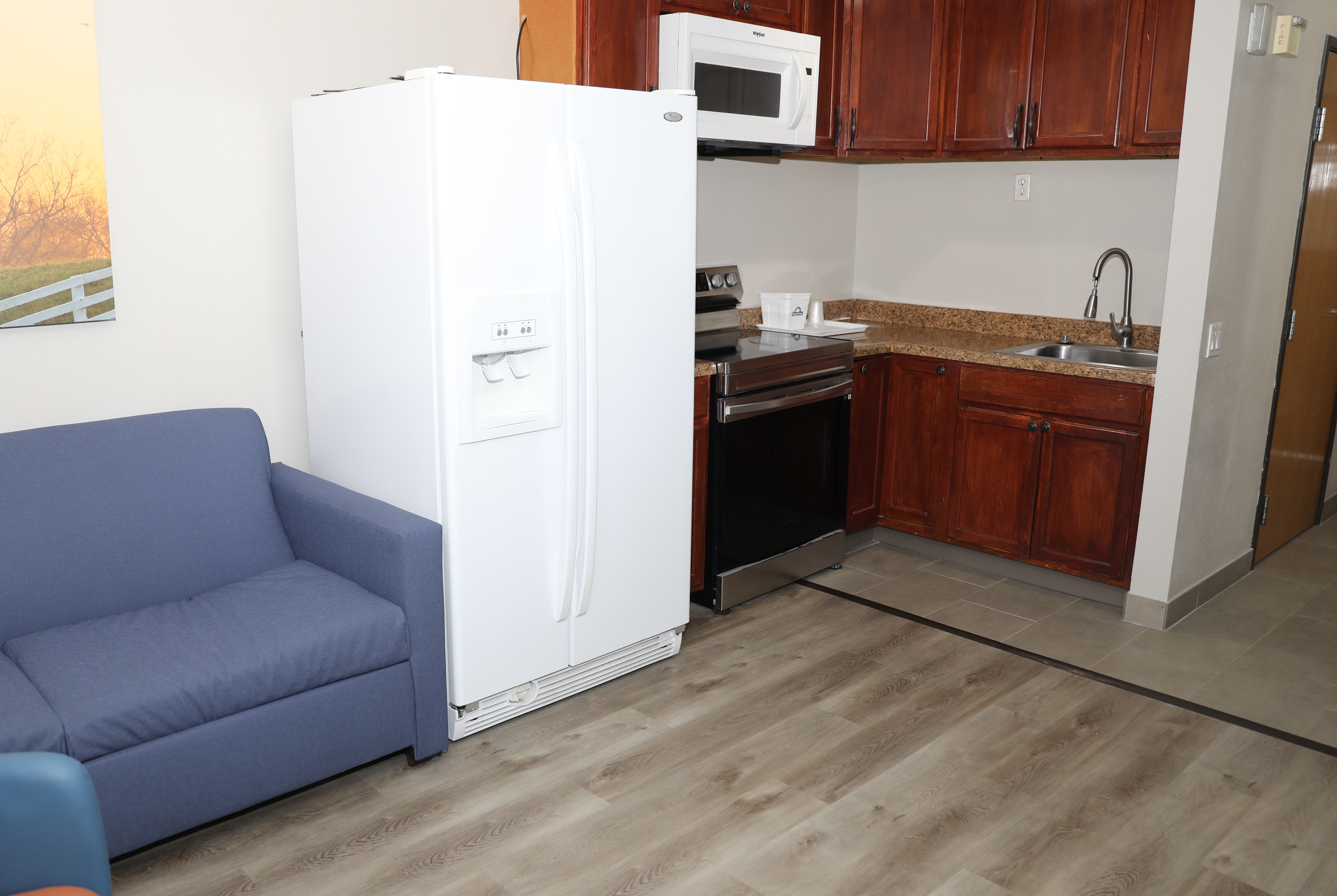 Guest room at the Days Inn & Suites by Wyndham San Antonio North Stone Oak in San Antonio, Texas