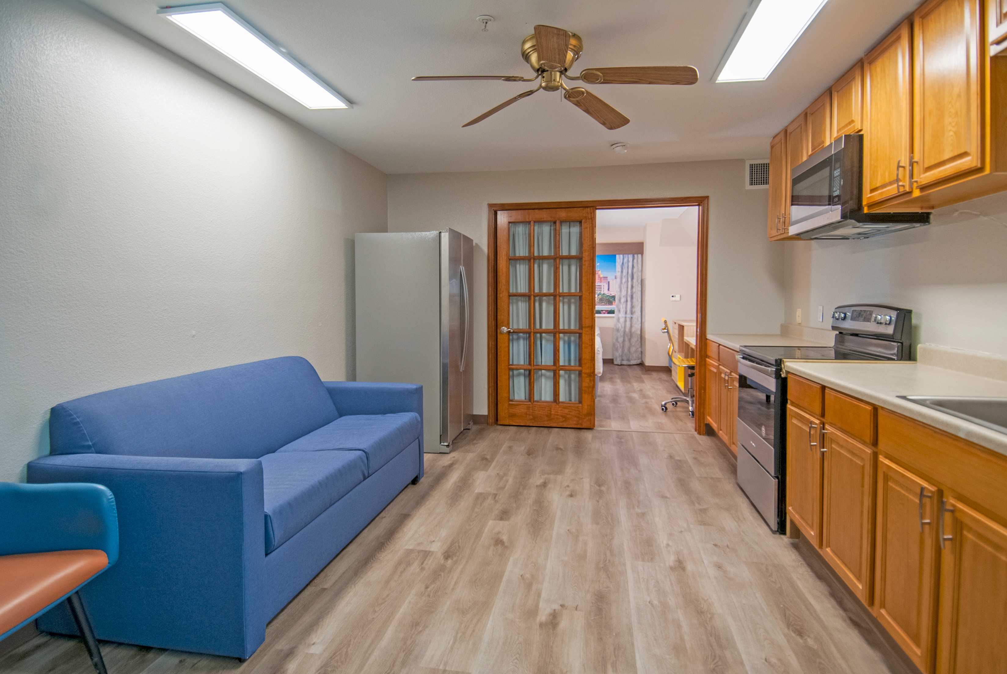 Guest room at the Days Inn & Suites by Wyndham San Antonio North Stone Oak in San Antonio, Texas