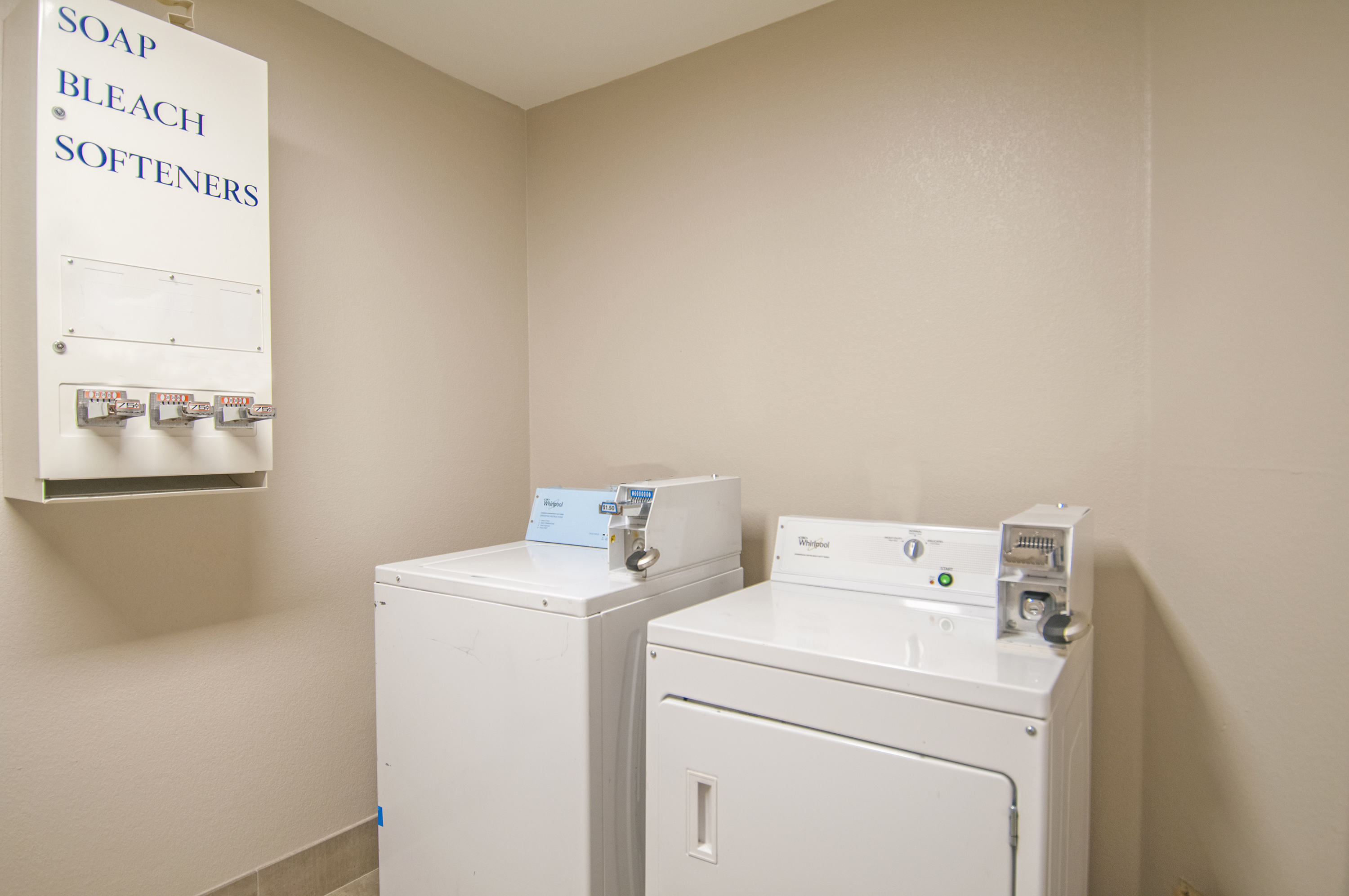 Laundry facilities at Days Inn & Suites by Wyndham San Antonio North Stone Oak in San Antonio, Texas