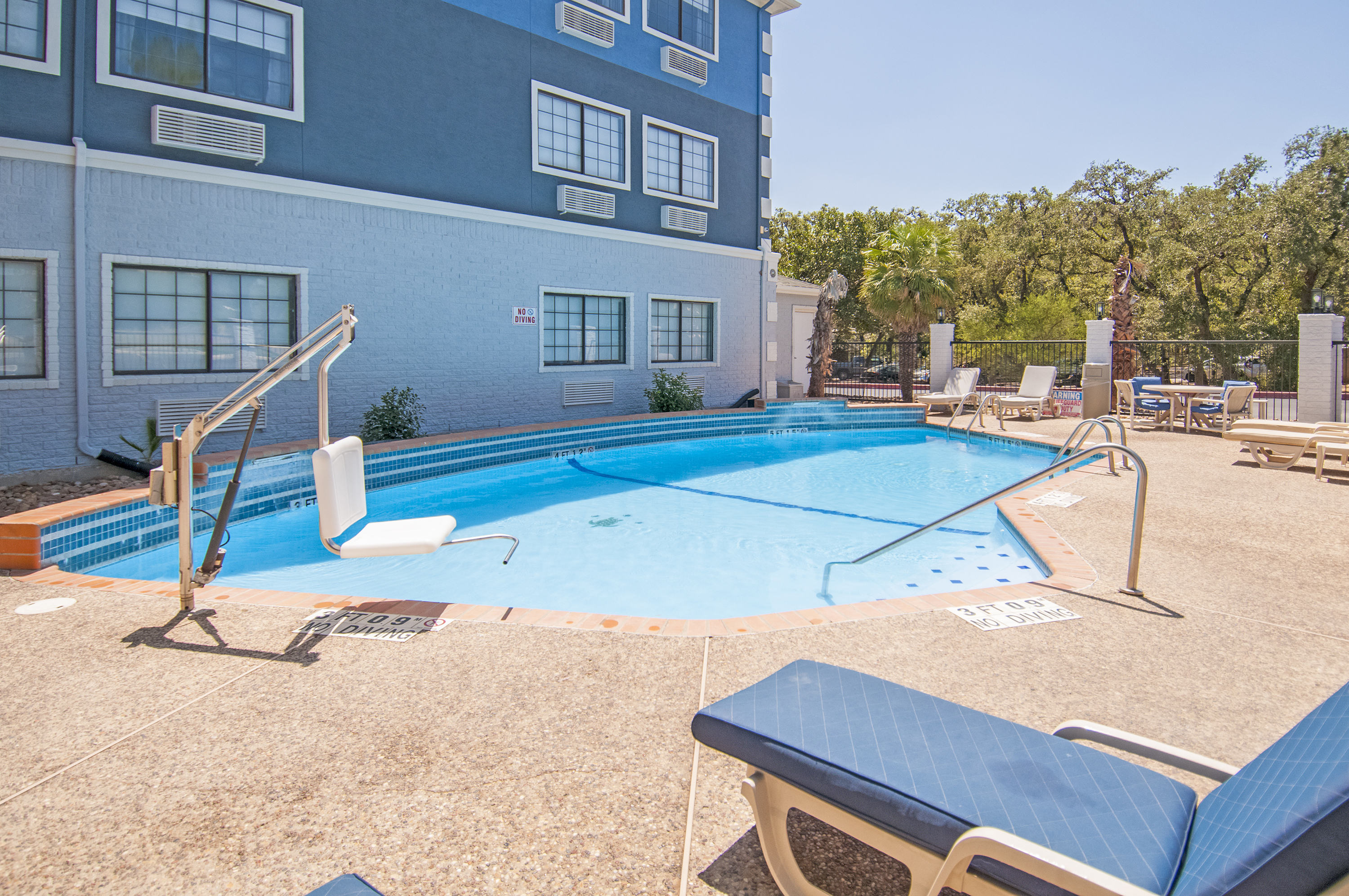 Pool at the Days Inn & Suites by Wyndham San Antonio North Stone Oak in San Antonio, Texas