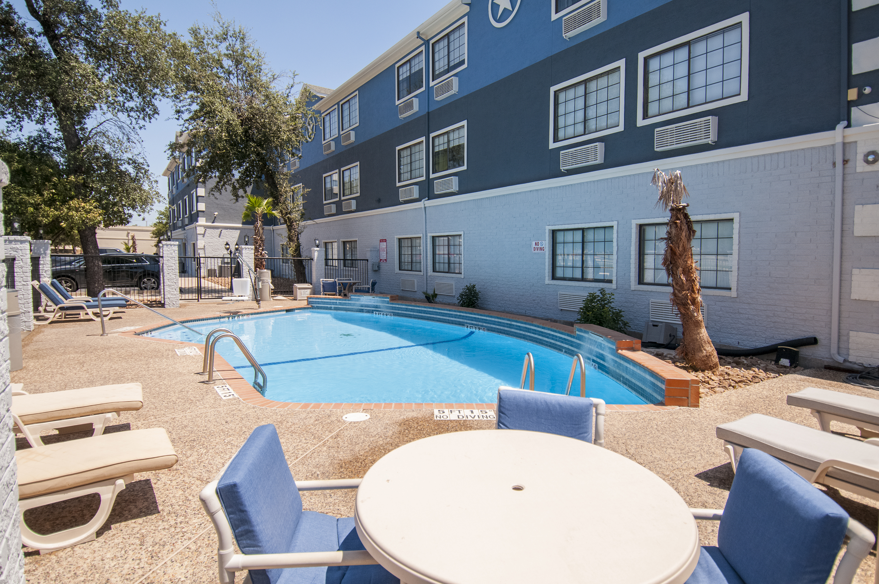 Pool at the Days Inn & Suites by Wyndham San Antonio North Stone Oak in San Antonio, Texas