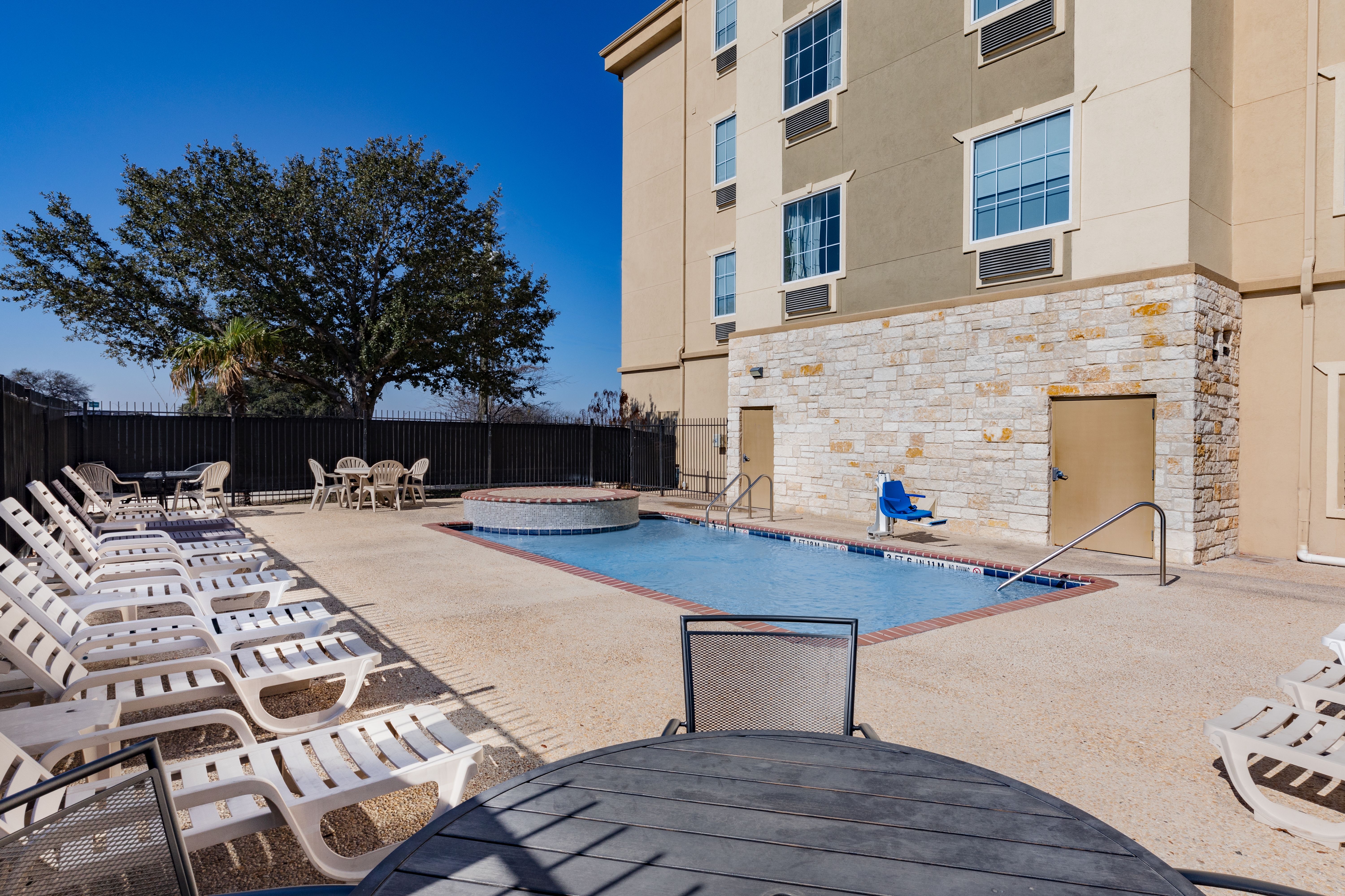 Pool at the Days Inn & Suites by Wyndham San Antonio near Frost Bank Ctr in San Antonio, Texas