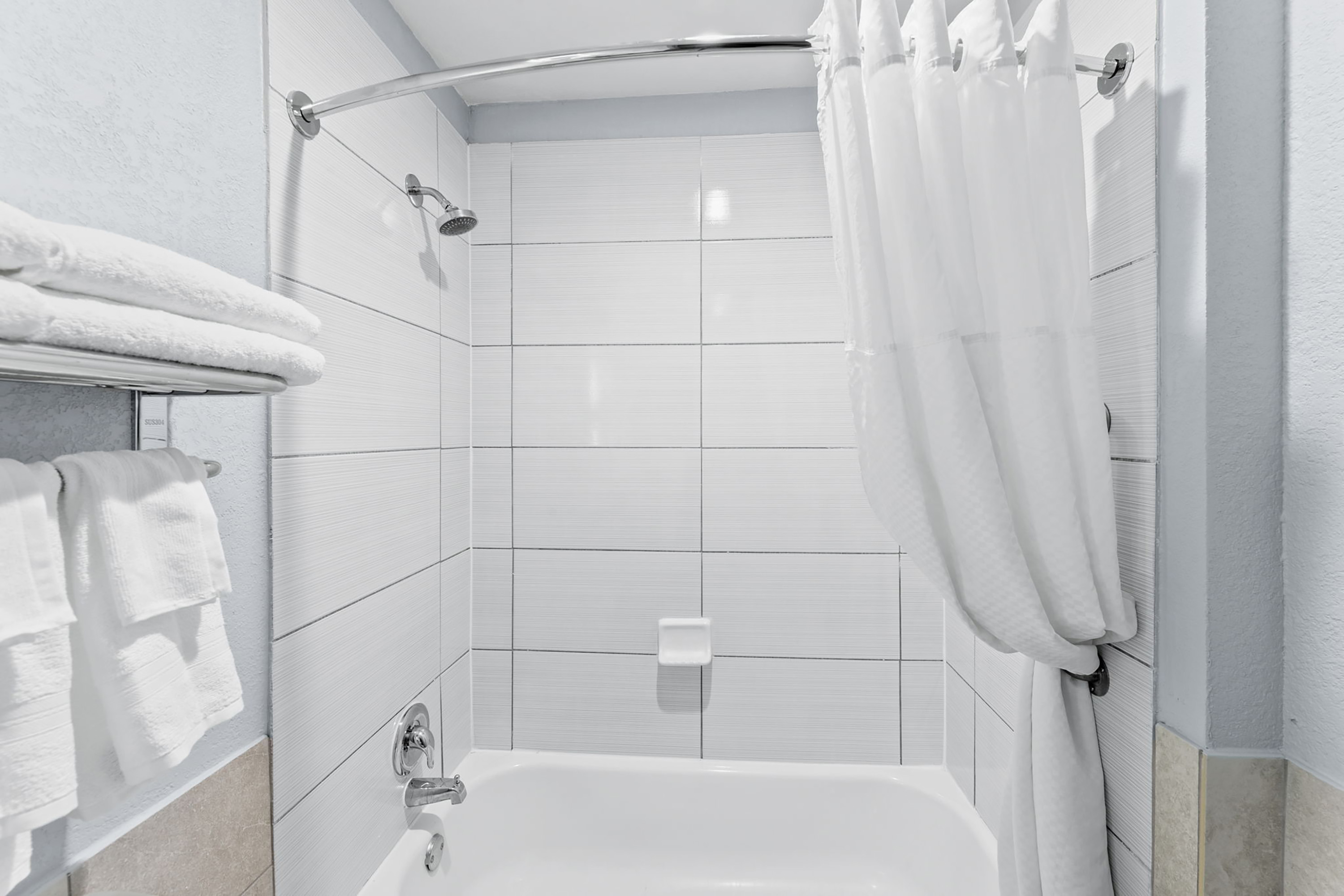 Guest room bath at the Days Inn by Wyndham San Antonio Downtown in San Antonio, Texas