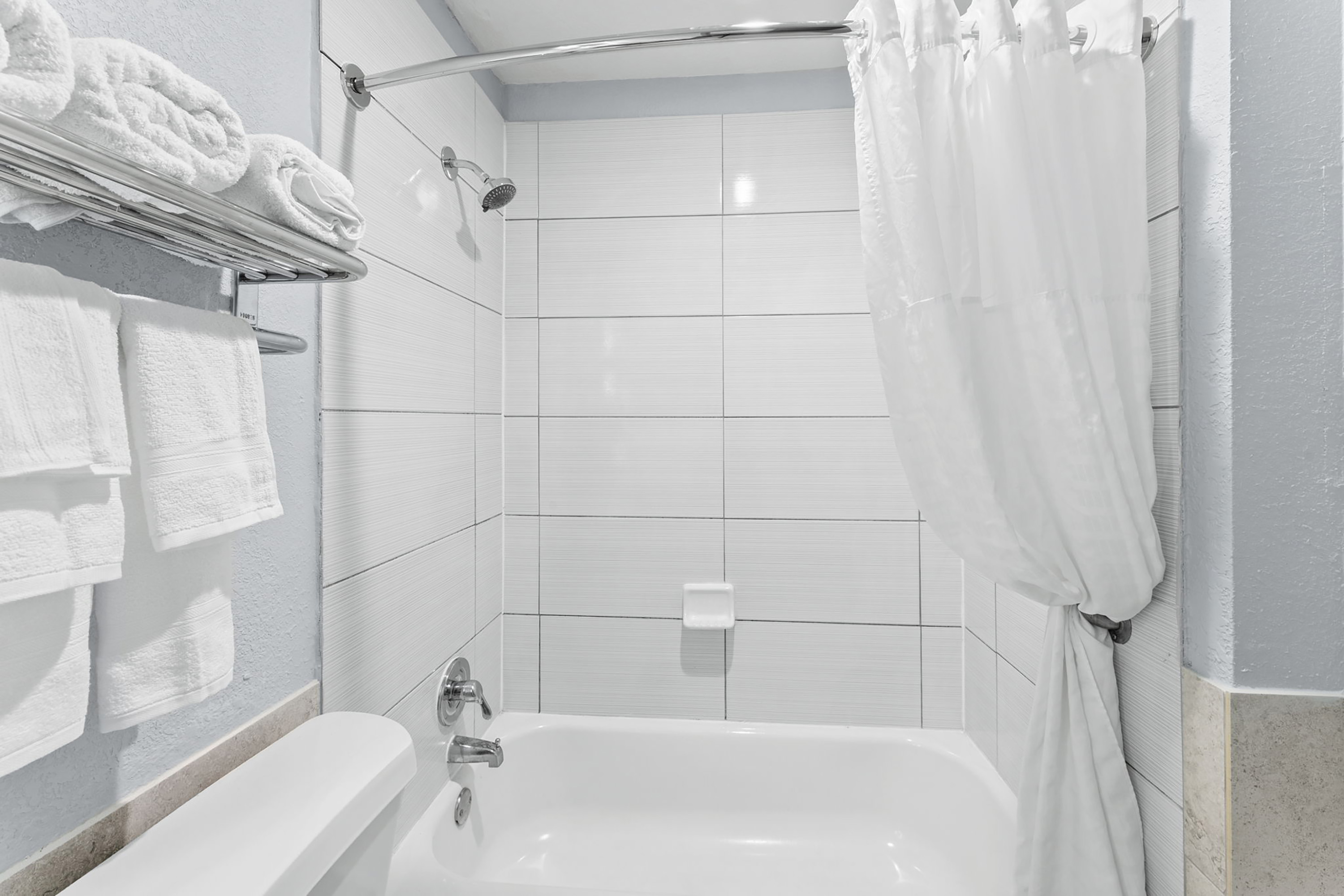 Guest room bath at the Days Inn by Wyndham San Antonio Downtown in San Antonio, Texas