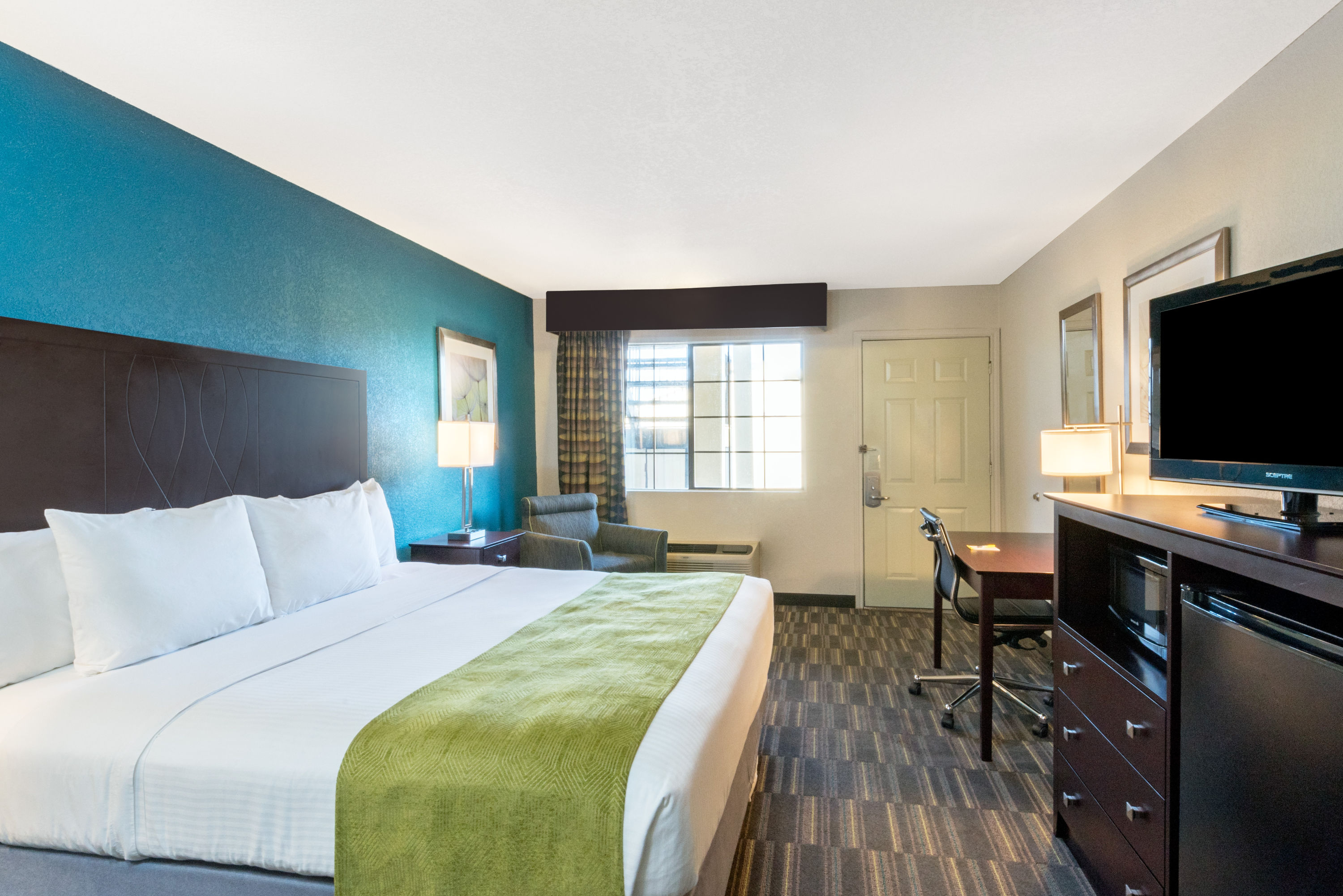 Guest room at the Days Inn by Wyndham Snyder in Snyder, Texas