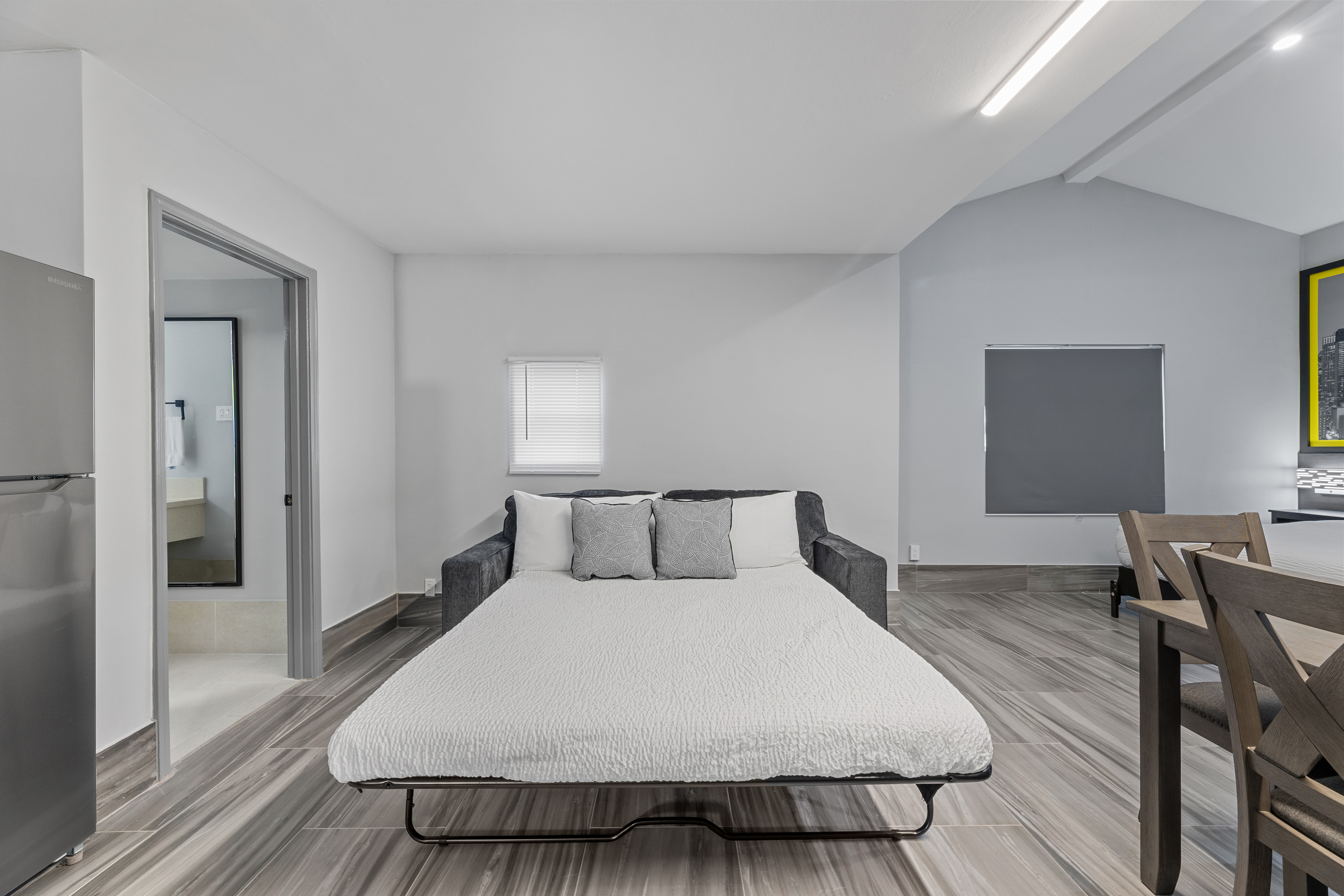 Guest room at the Days Inn & Suites by Wyndham Texas City/Galveston Area in Texas City, Texas