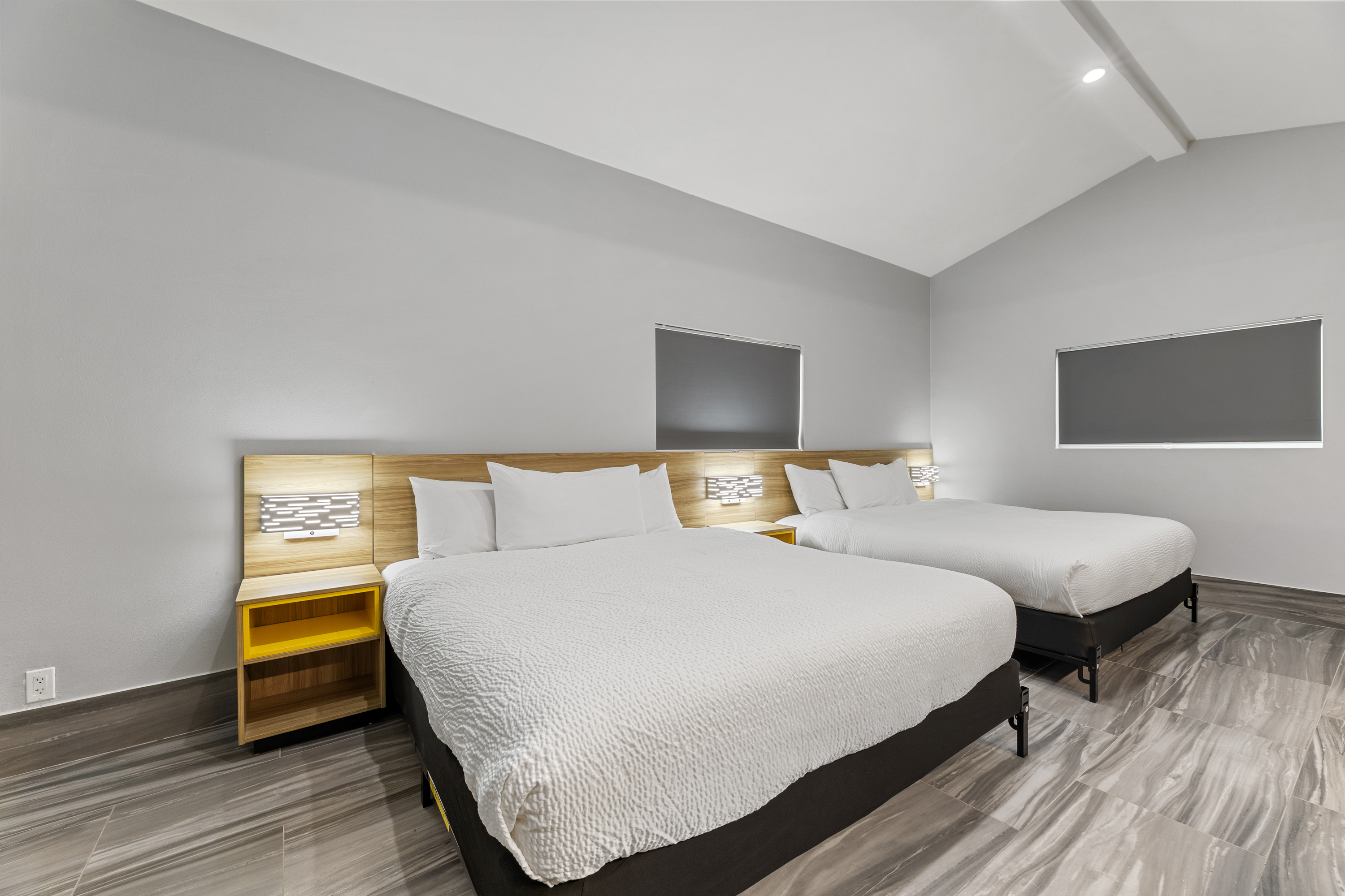 Guest room at the Days Inn & Suites by Wyndham Texas City/Galveston Area in Texas City, Texas