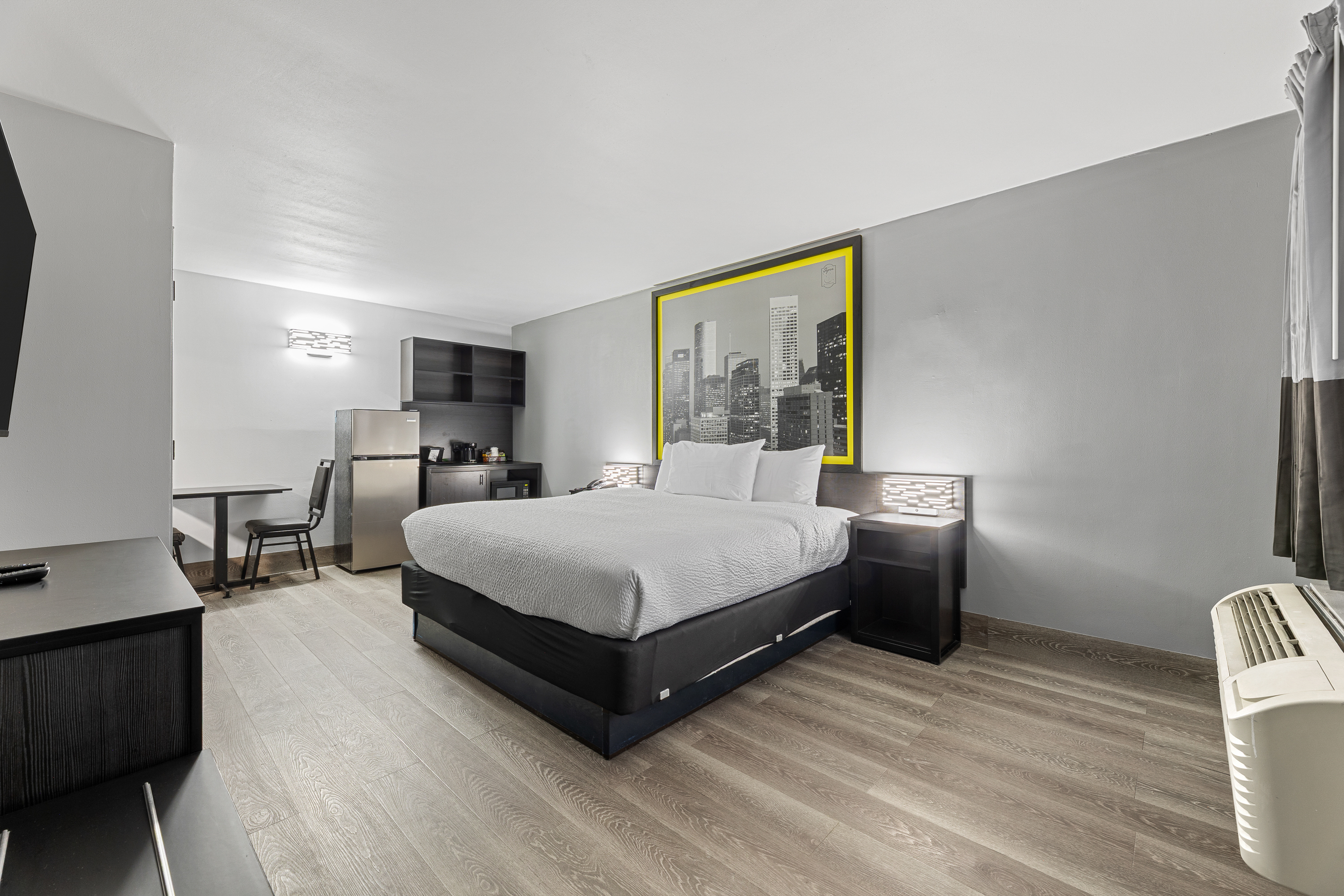 Guest room at the Days Inn & Suites by Wyndham Texas City/Galveston Area in Texas City, Texas