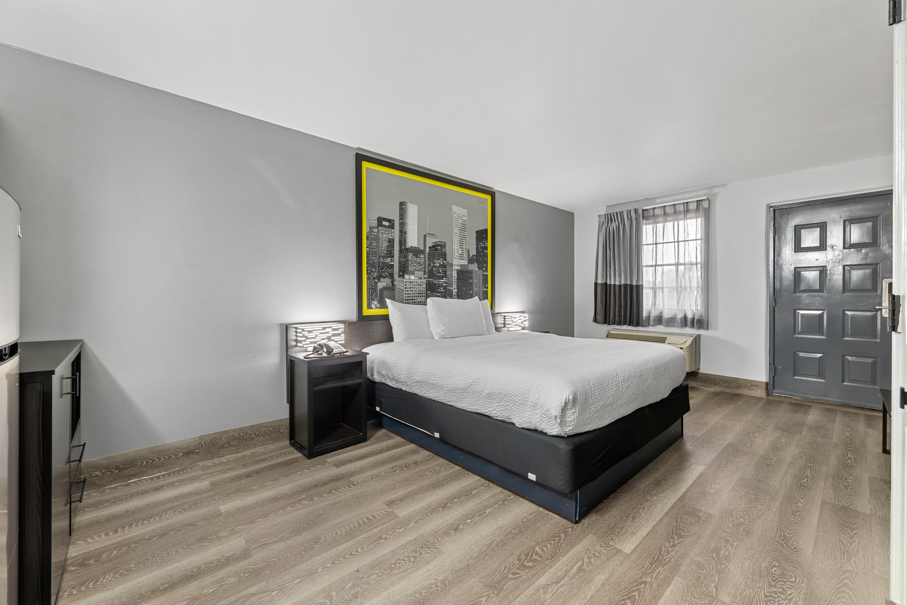 Guest room at the Days Inn & Suites by Wyndham Texas City/Galveston Area in Texas City, Texas