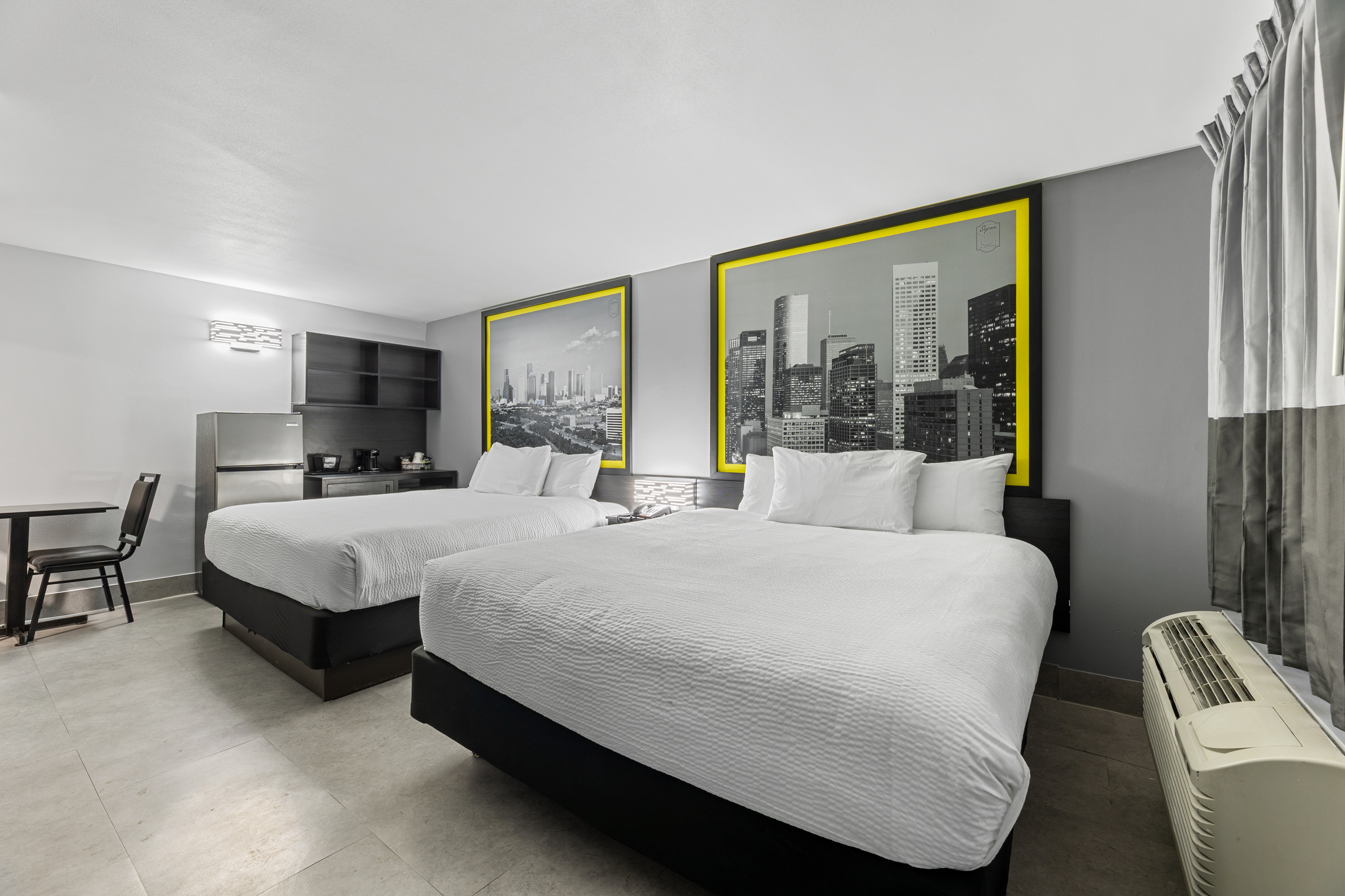 Guest room at the Days Inn & Suites by Wyndham Texas City/Galveston Area in Texas City, Texas