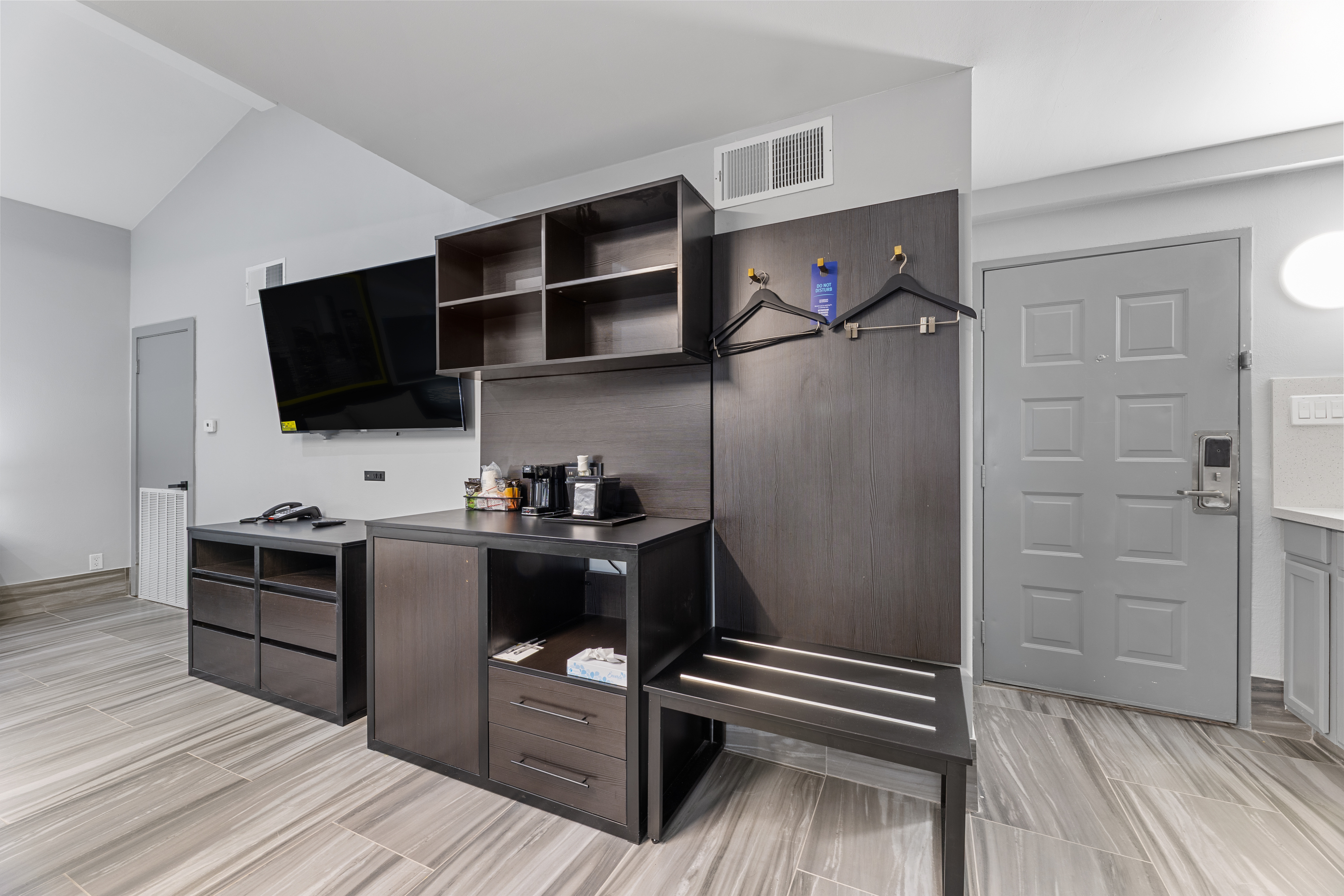 Guest room at the Days Inn & Suites by Wyndham Texas City/Galveston Area in Texas City, Texas