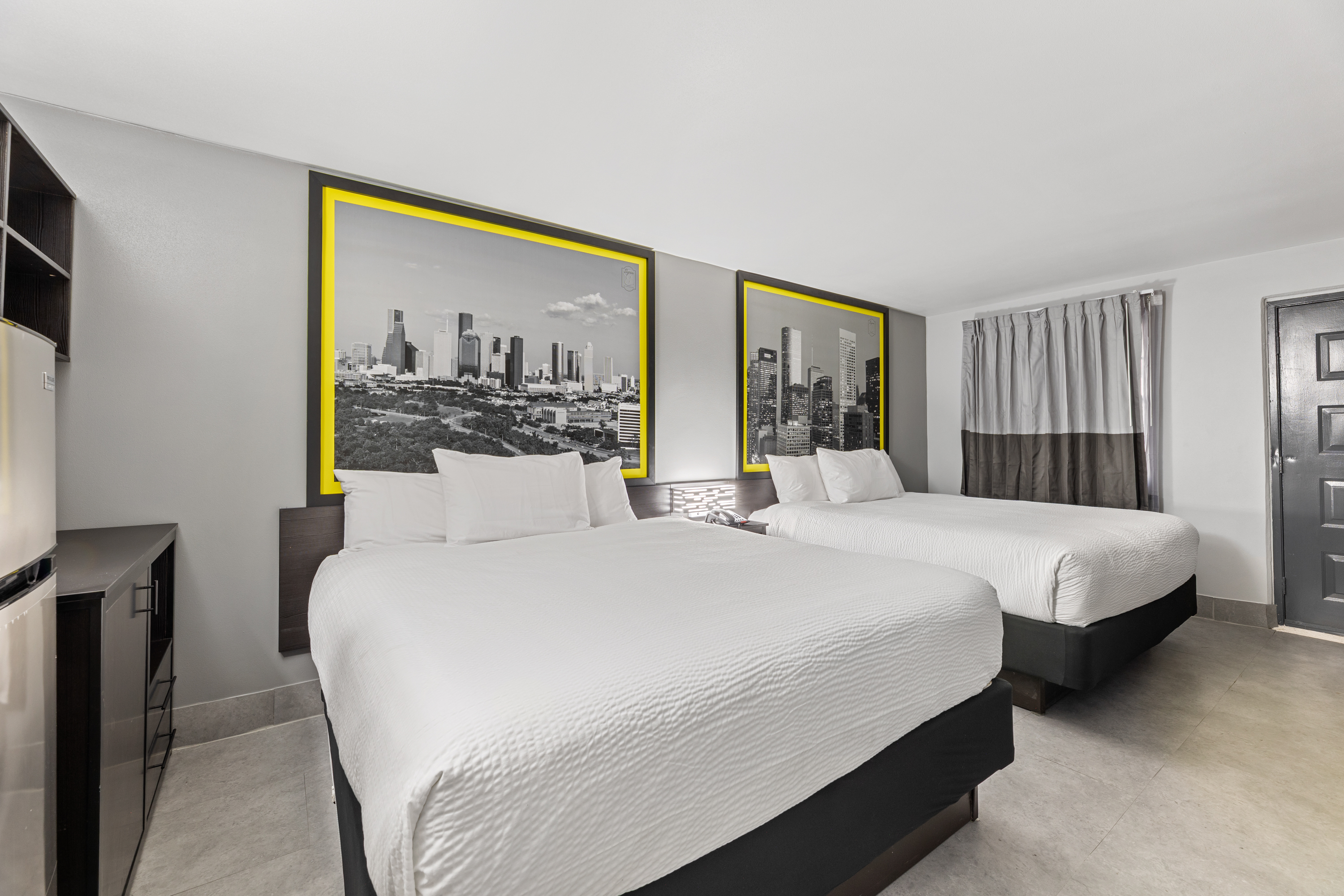 Guest room at the Days Inn & Suites by Wyndham Texas City/Galveston Area in Texas City, Texas