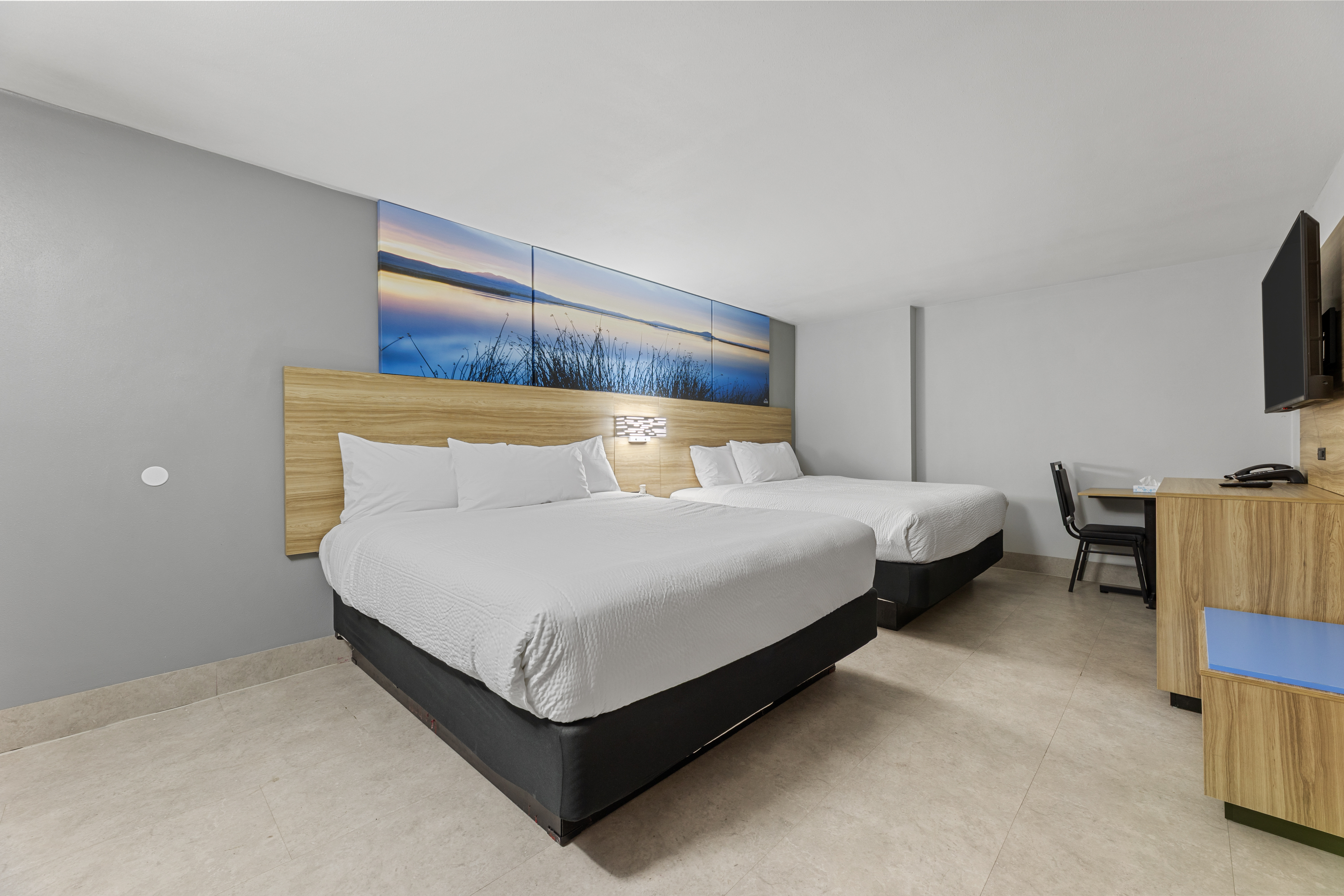 Guest room at the Days Inn & Suites by Wyndham Texas City/Galveston Area in Texas City, Texas