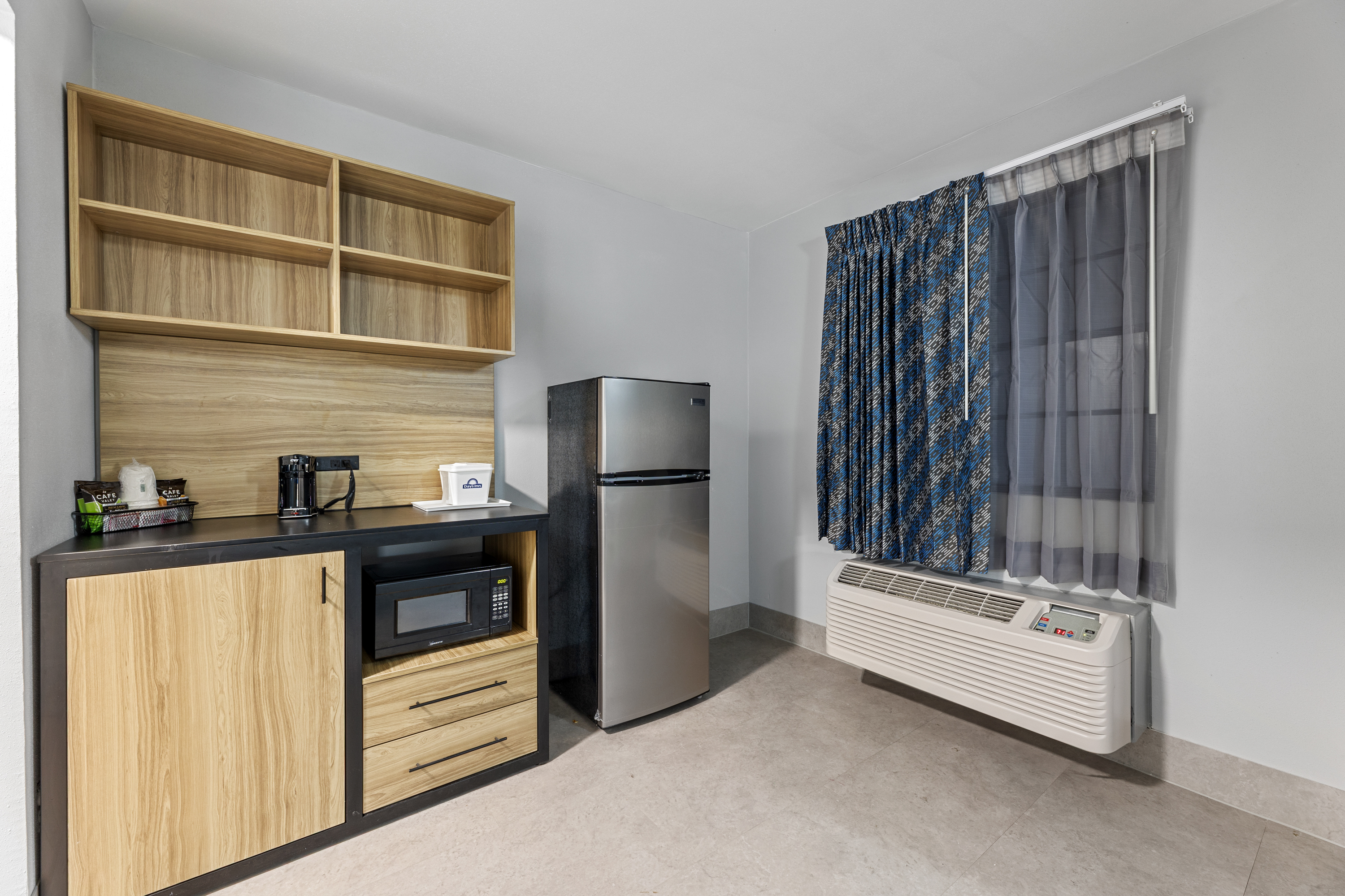 Guest room at the Days Inn & Suites by Wyndham Texas City/Galveston Area in Texas City, Texas