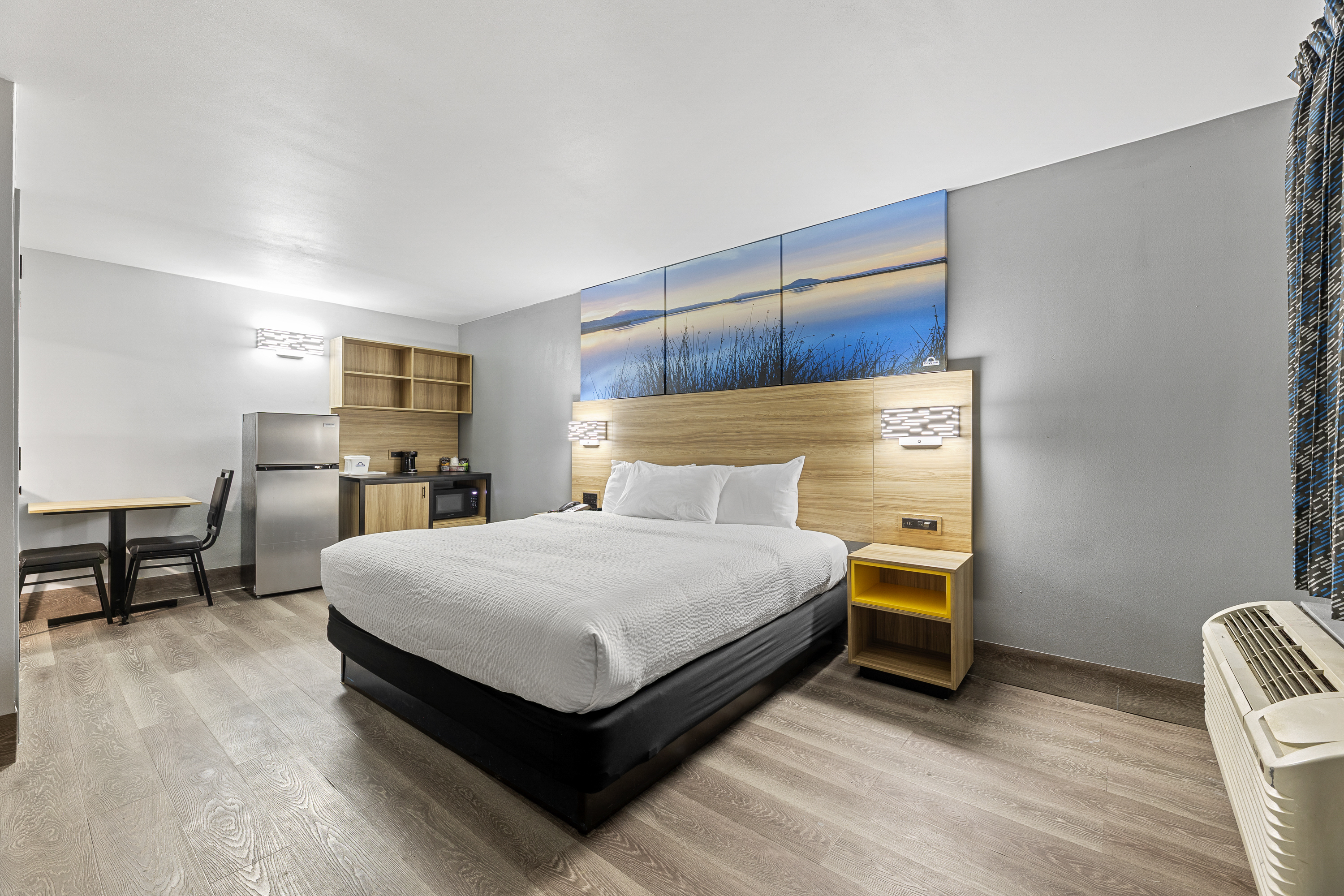 Guest room at the Days Inn & Suites by Wyndham Texas City in Texas City, Texas