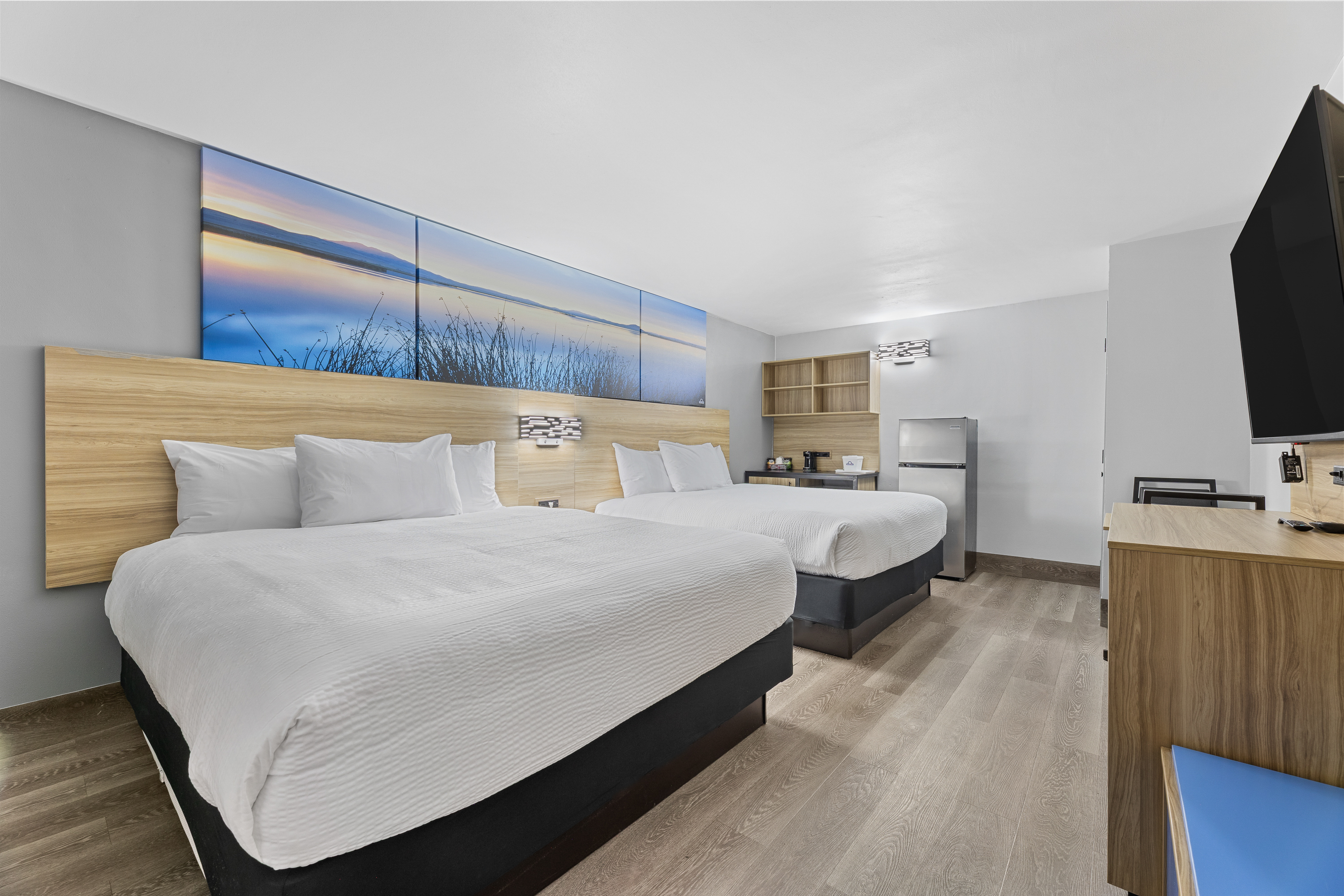 Guest room at the Days Inn & Suites by Wyndham Texas City in Texas City, Texas