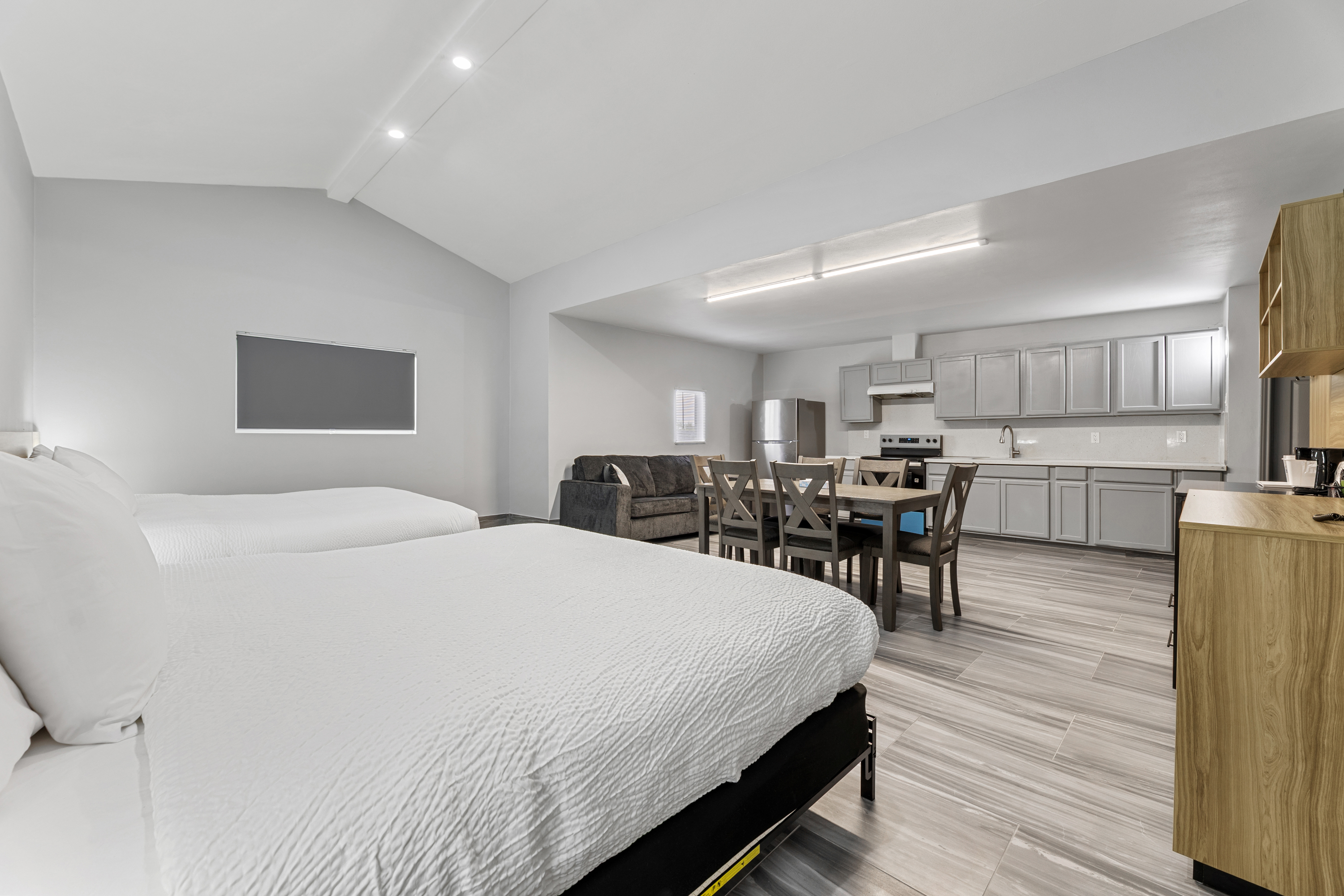 Guest room at the Days Inn & Suites by Wyndham Texas City in Texas City, Texas