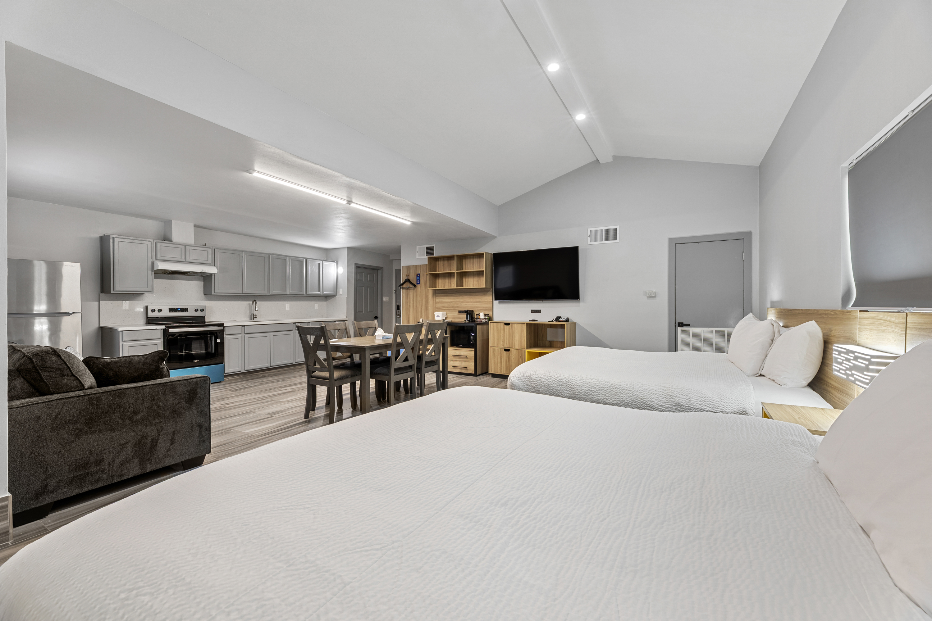 Guest room at the Days Inn & Suites by Wyndham Texas City in Texas City, Texas