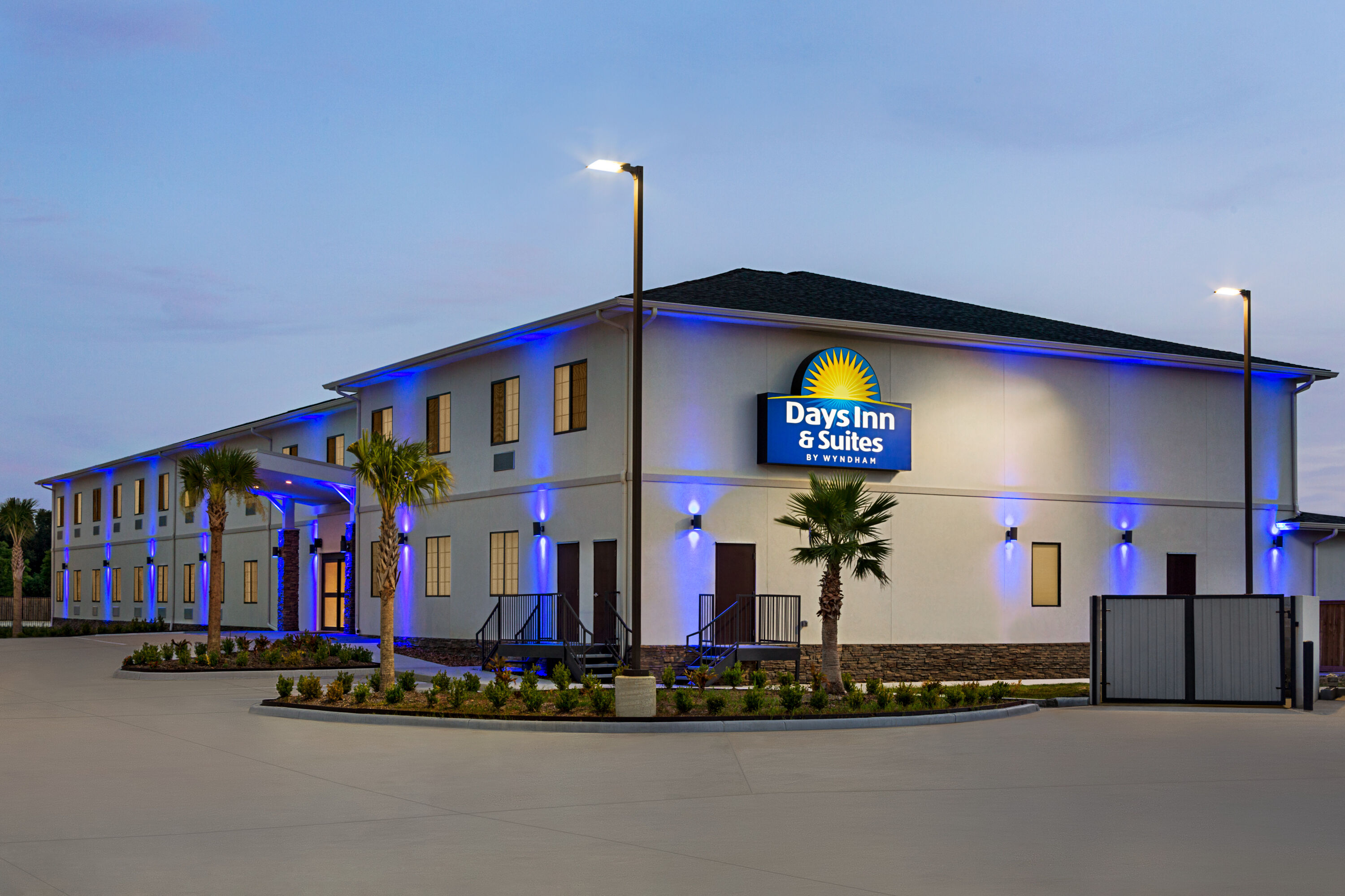 Exterior of Days Inn & Suites by Wyndham Greater Tomball hotel in Tomball, Texas