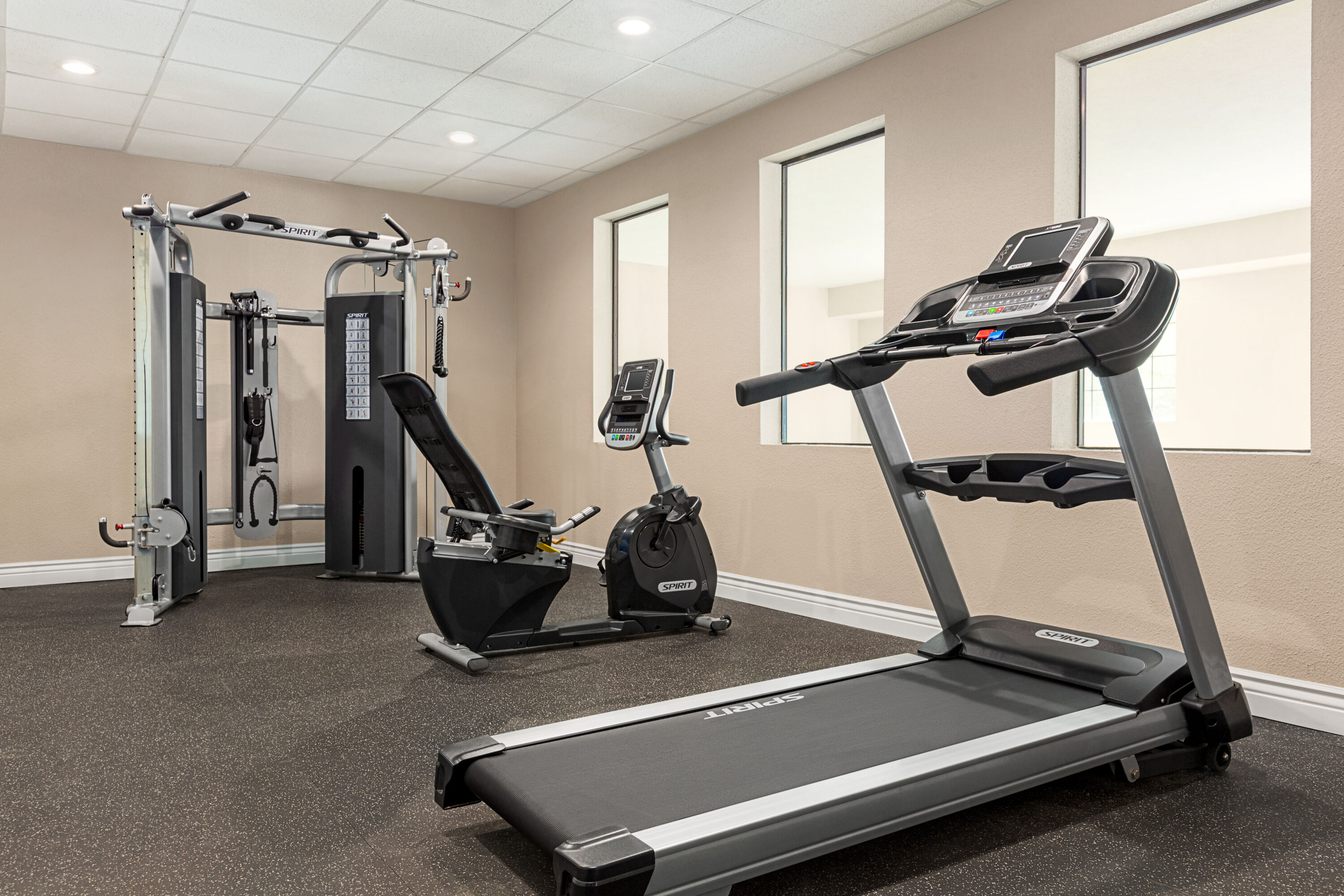 Fitness room at Days Inn & Suites by Wyndham Greater Tomball in Tomball, Texas