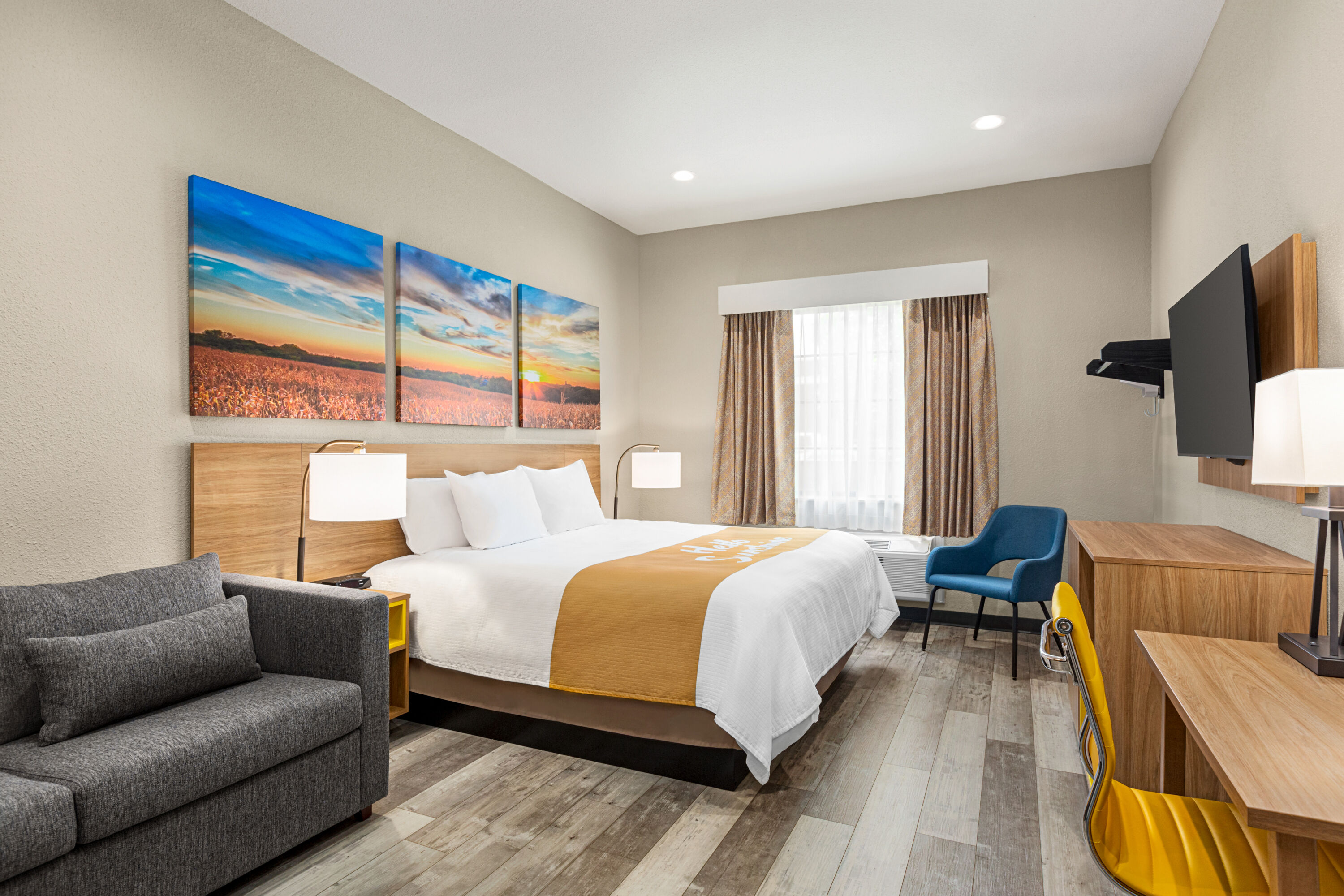 Guest room at the Days Inn & Suites by Wyndham Greater Tomball in Tomball, Texas