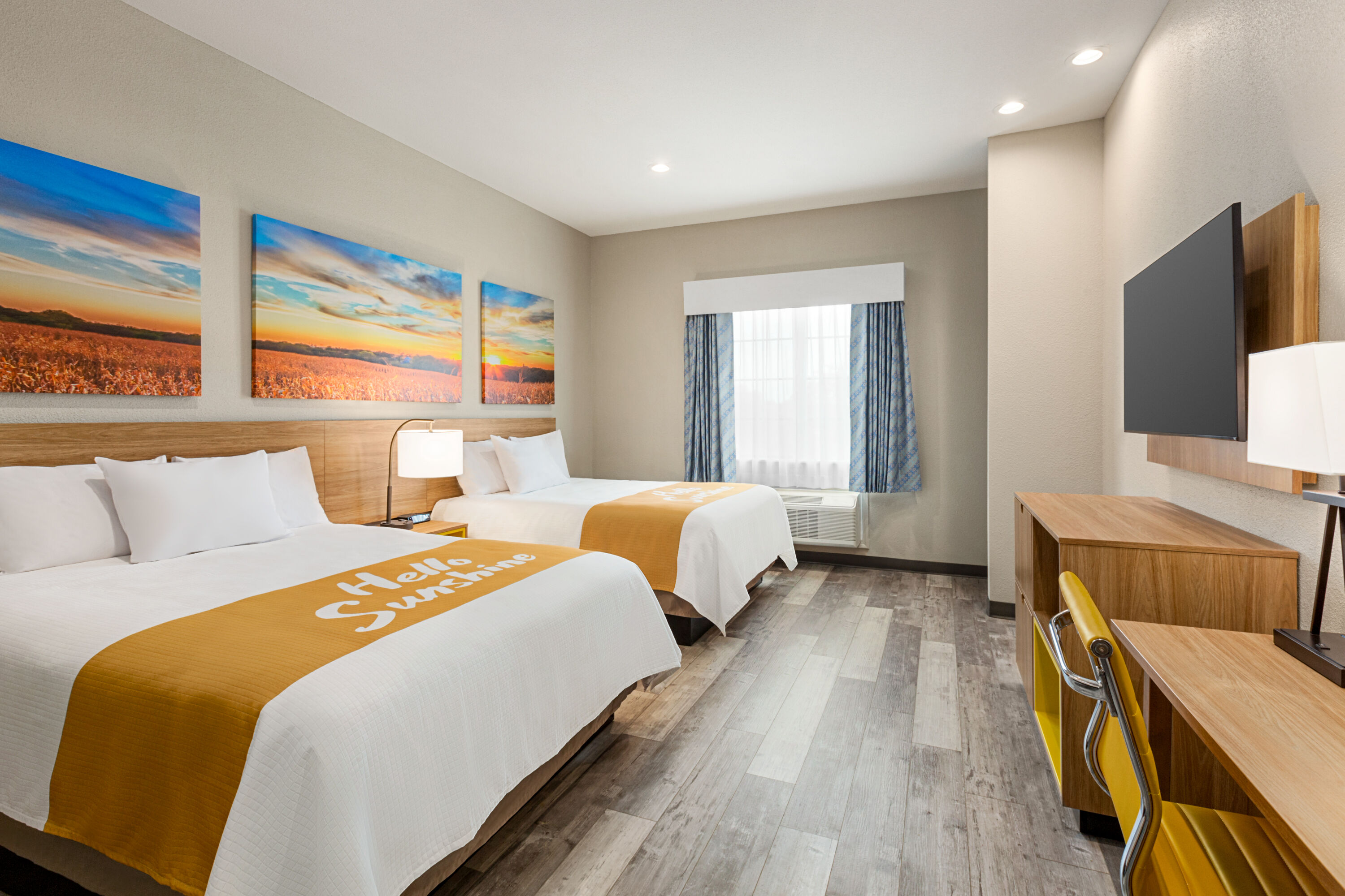 Guest room at the Days Inn & Suites by Wyndham Greater Tomball in Tomball, Texas
