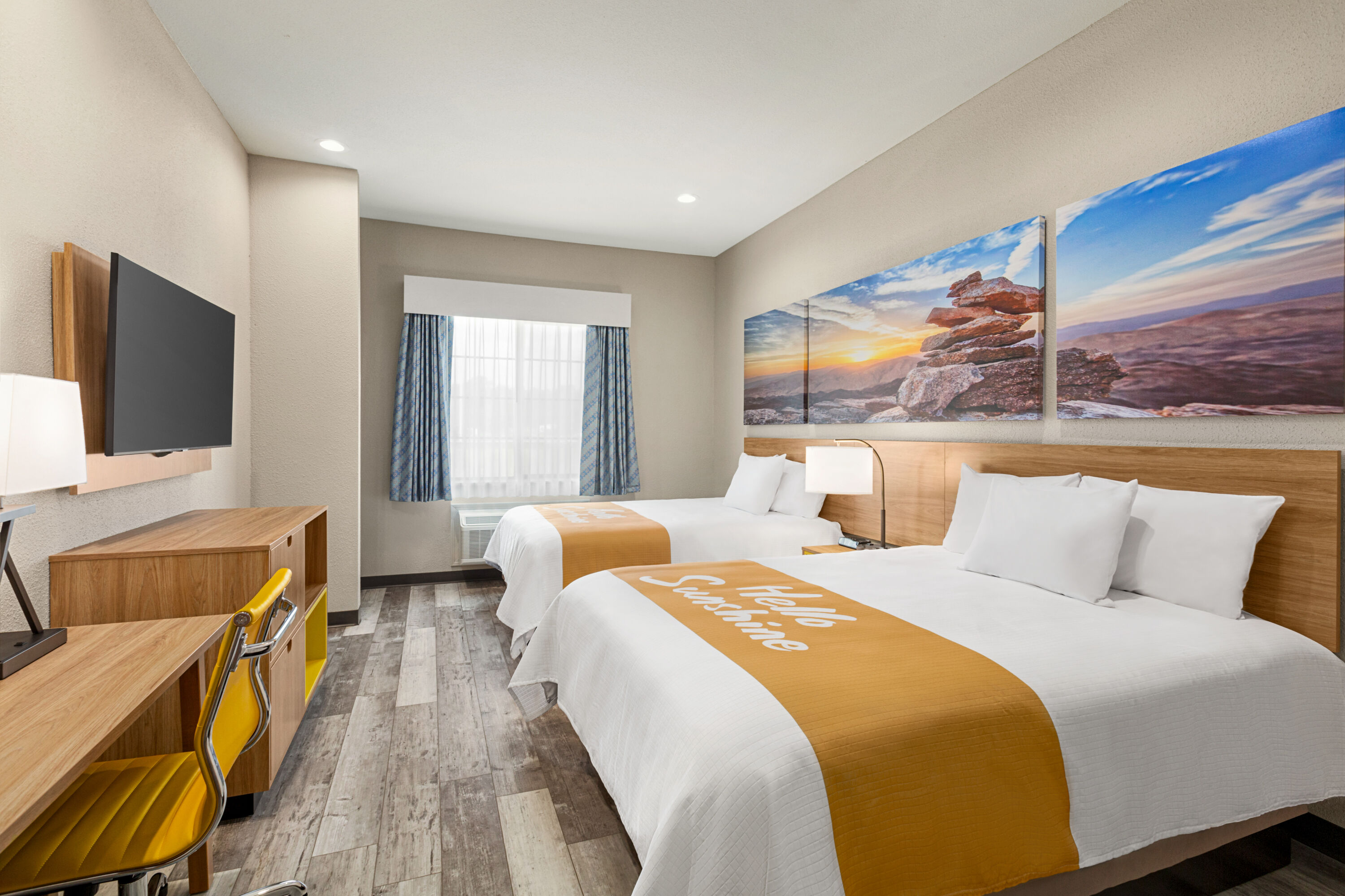 Guest room at the Days Inn & Suites by Wyndham Greater Tomball in Tomball, Texas