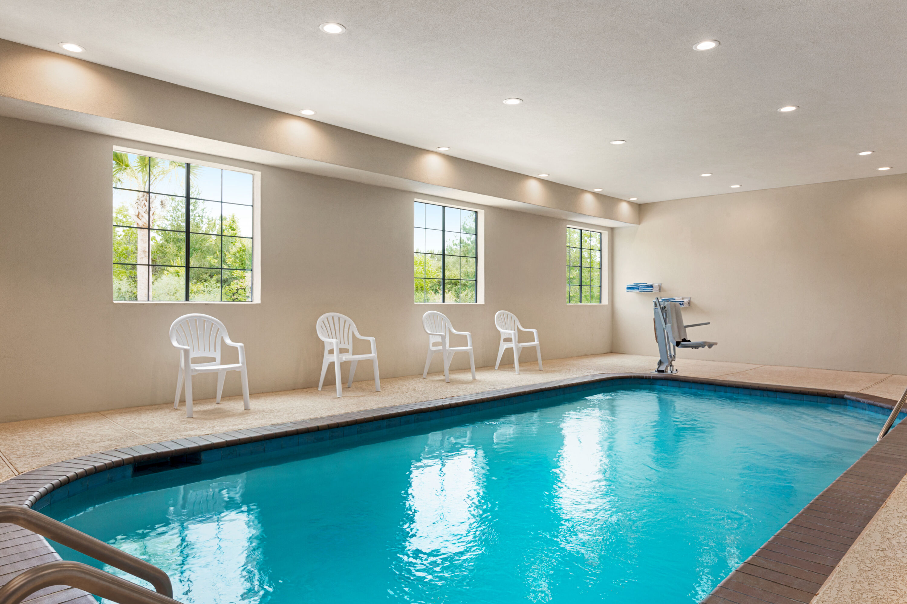 Indoor pool at the Days Inn & Suites by Wyndham Greater Tomball in Tomball, Texas